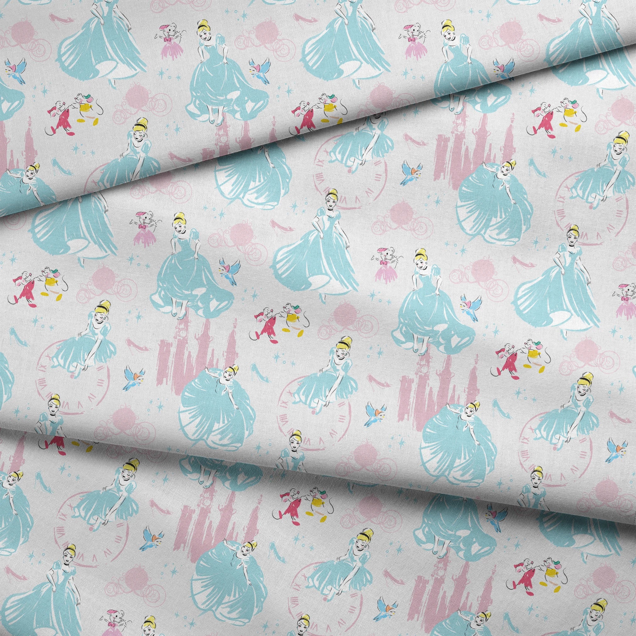 Dreamy Cinderella pattern with blue gowns, castle silhouettes, glass slippers, and blue birds on pale background fabric fold mockup