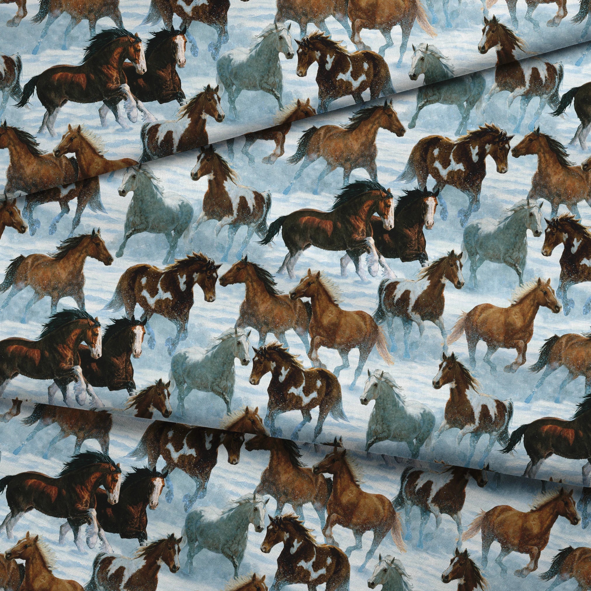 Wild horses running through snowy landscape in various brown, black and gray colors fabric fold mockup