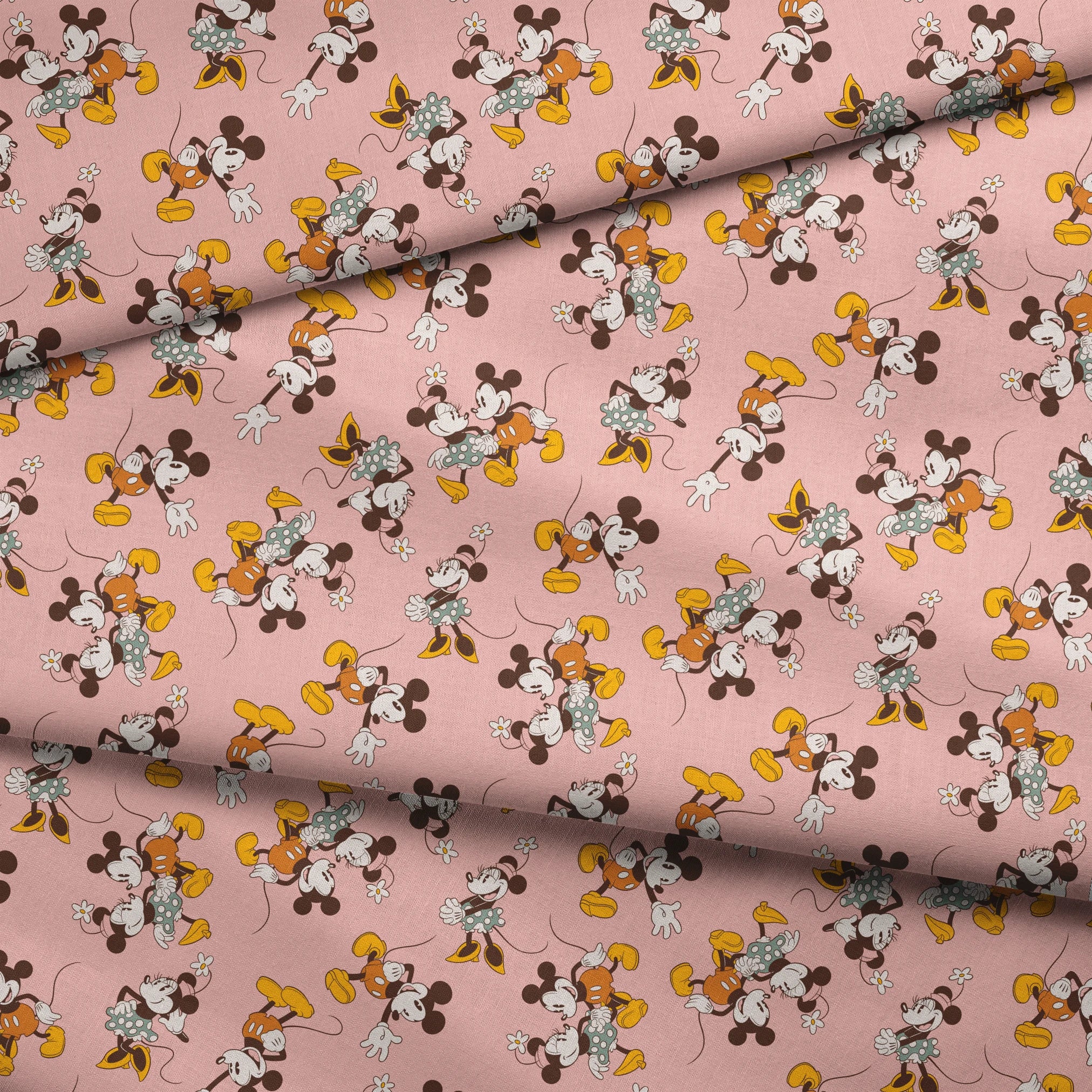 Mickey and Minnie Mouse characters in vintage style on pink background with repeated pattern fabric fold mockup