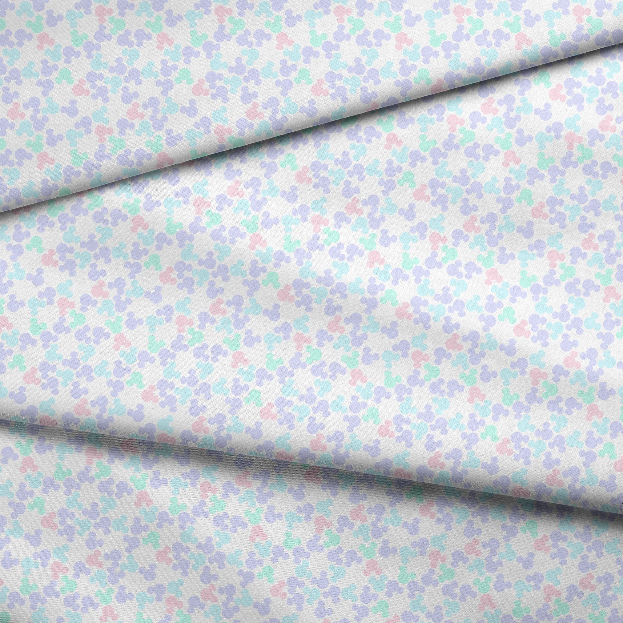 Pastel circular pattern with purple, light blue, green, and pink bubble shapes on white background fabric fold mockup