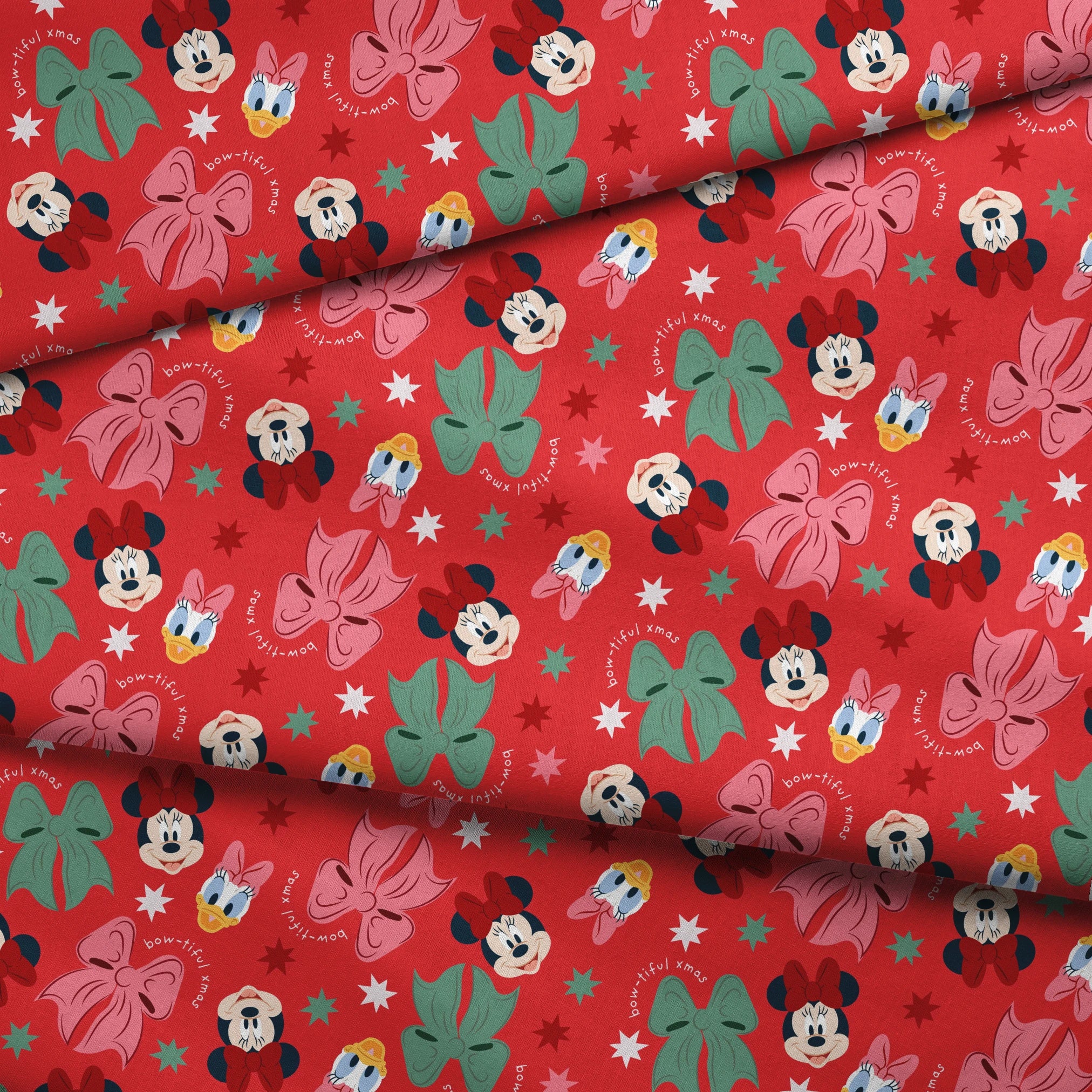 Disney character pattern with Minnie Mouse, Mickey Mouse and Donald Duck on red background with bows and stars fabric fold mockup