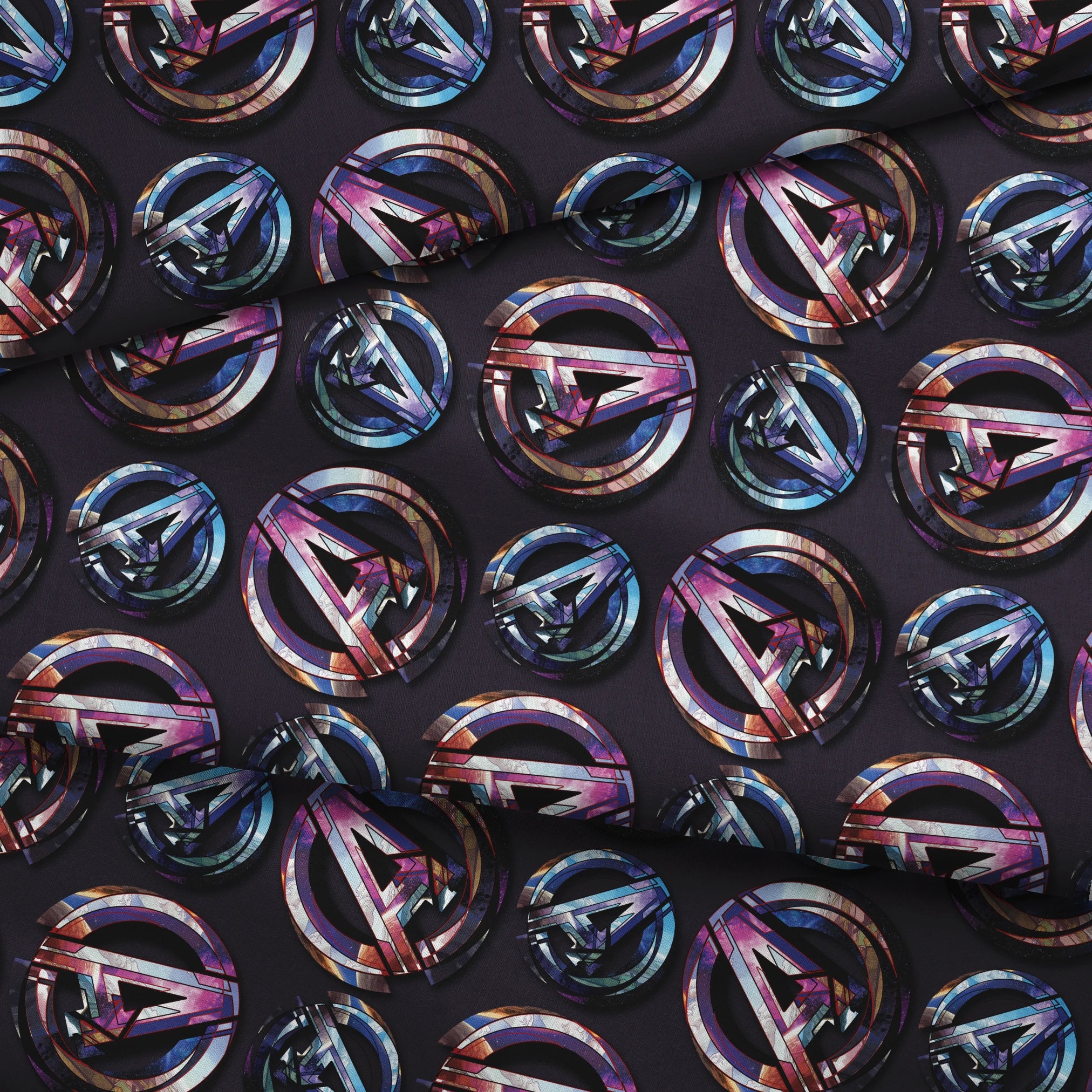 Colorful metallic Avengers logo pattern with iridescent purple and blue reflections on dark background fabric fold mockup