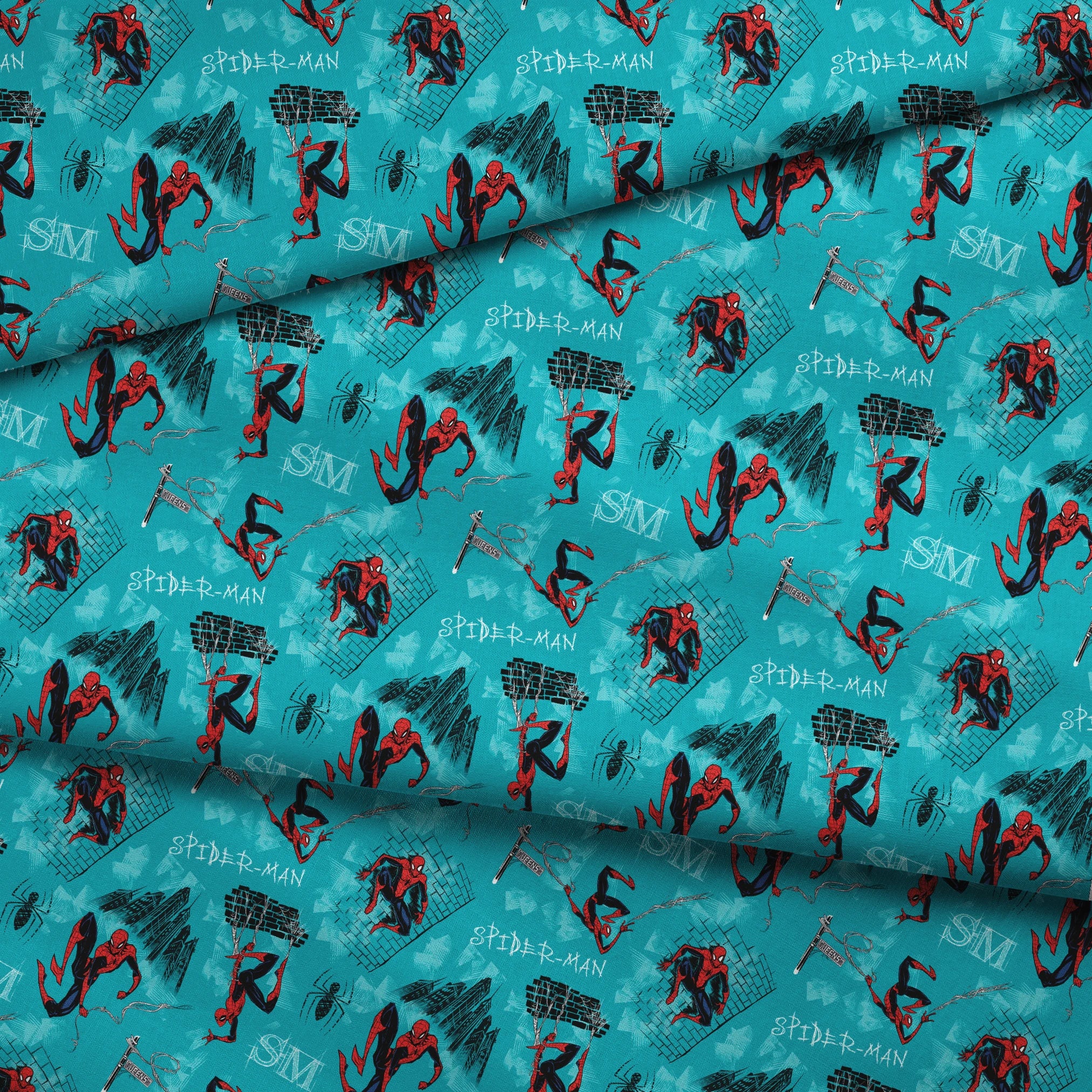 Spider-Man pattern on turquoise background with multiple poses, web designs, and logos fabric fold mockup