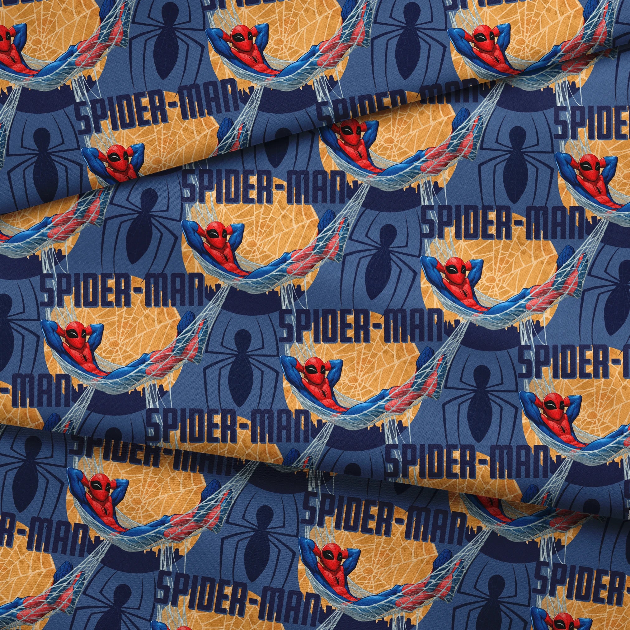 Spider-Man pattern with cartoon superhero in red and blue swinging on webbing against navy and gold background fabric fold mockup