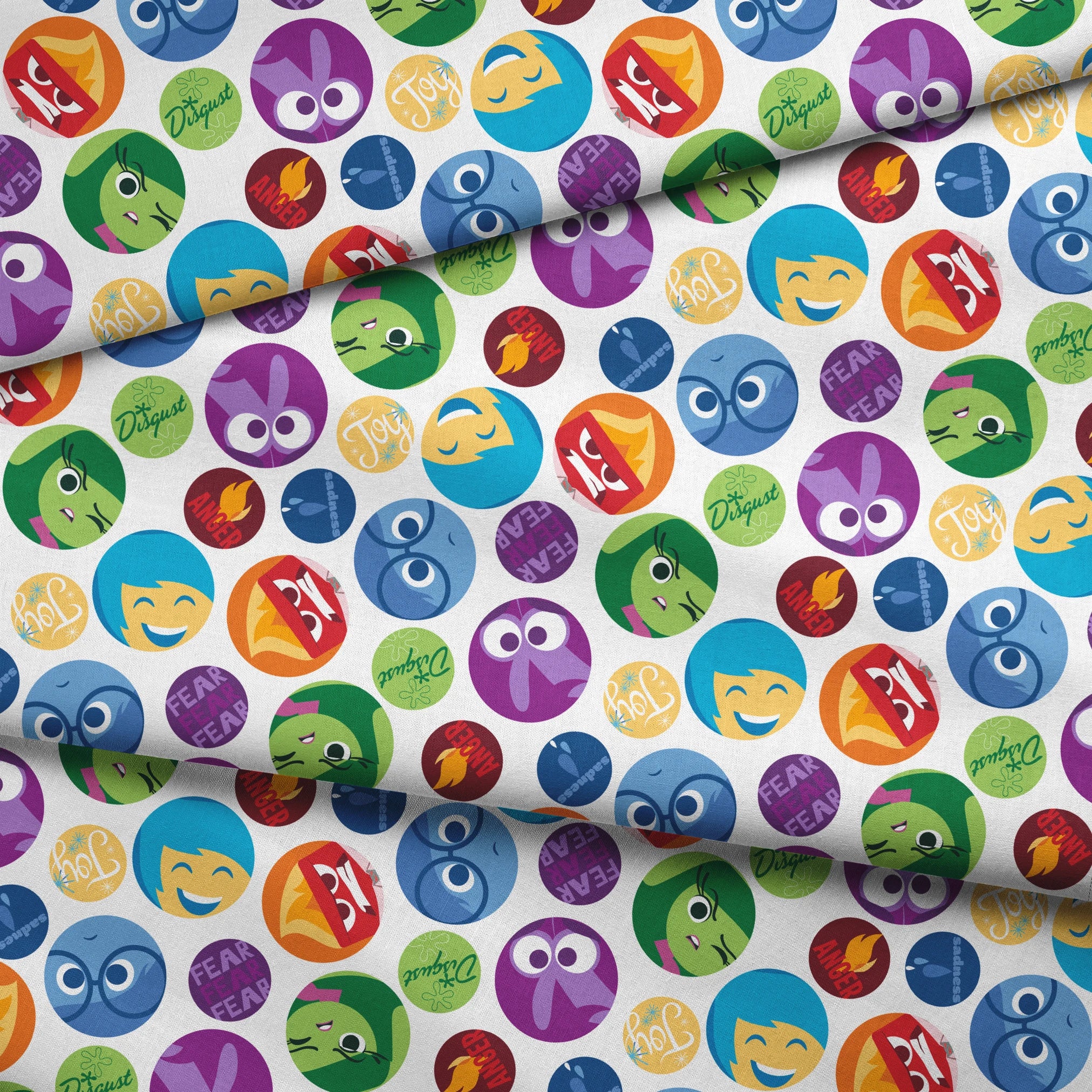 Colorful Inside Out character circles with various expressions in purple, green, blue, yellow, and red fabric fold mockup