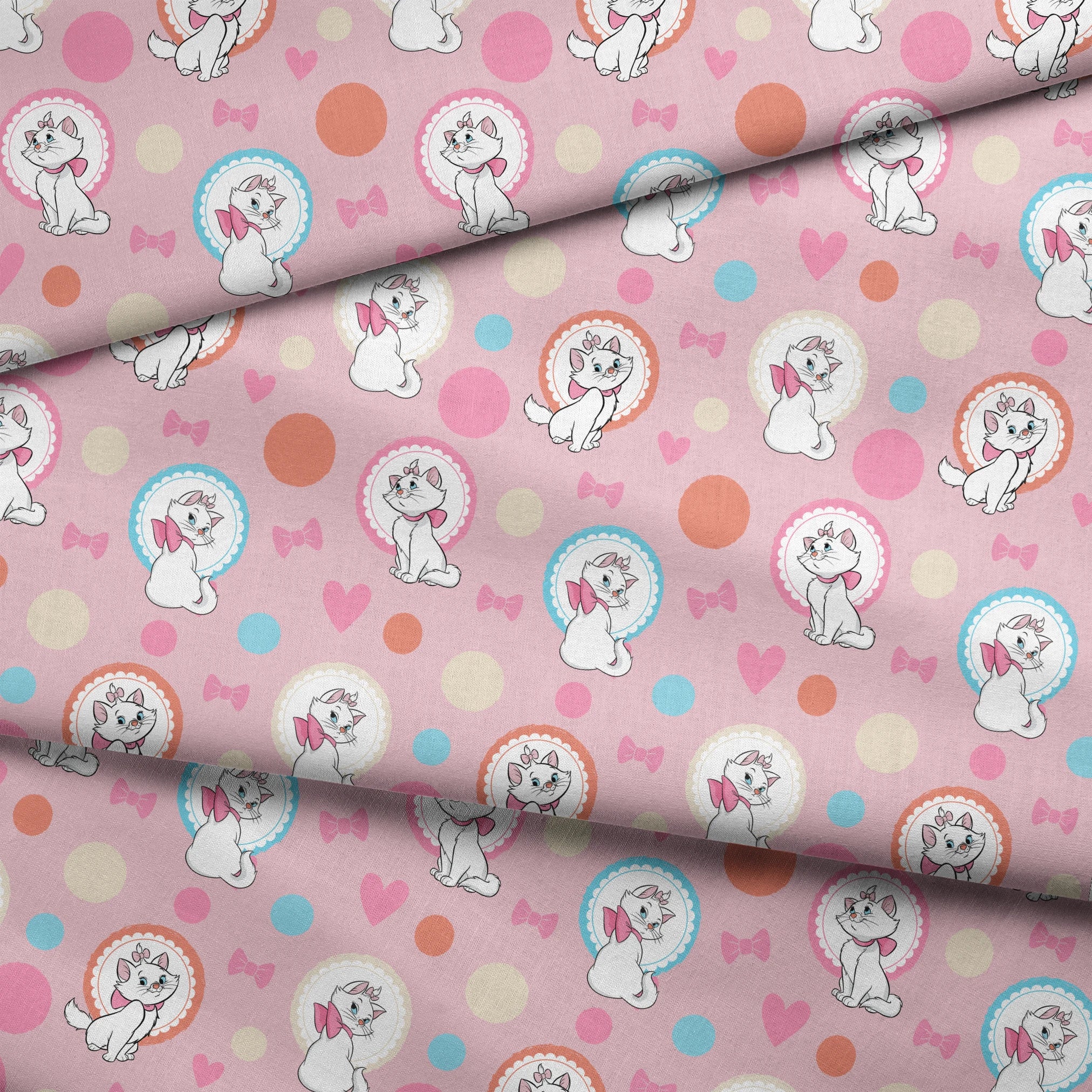 Marie from The Aristocats with pink bows in decorative circular frames on pink polka dot background with bow motifs fabric fold mockup