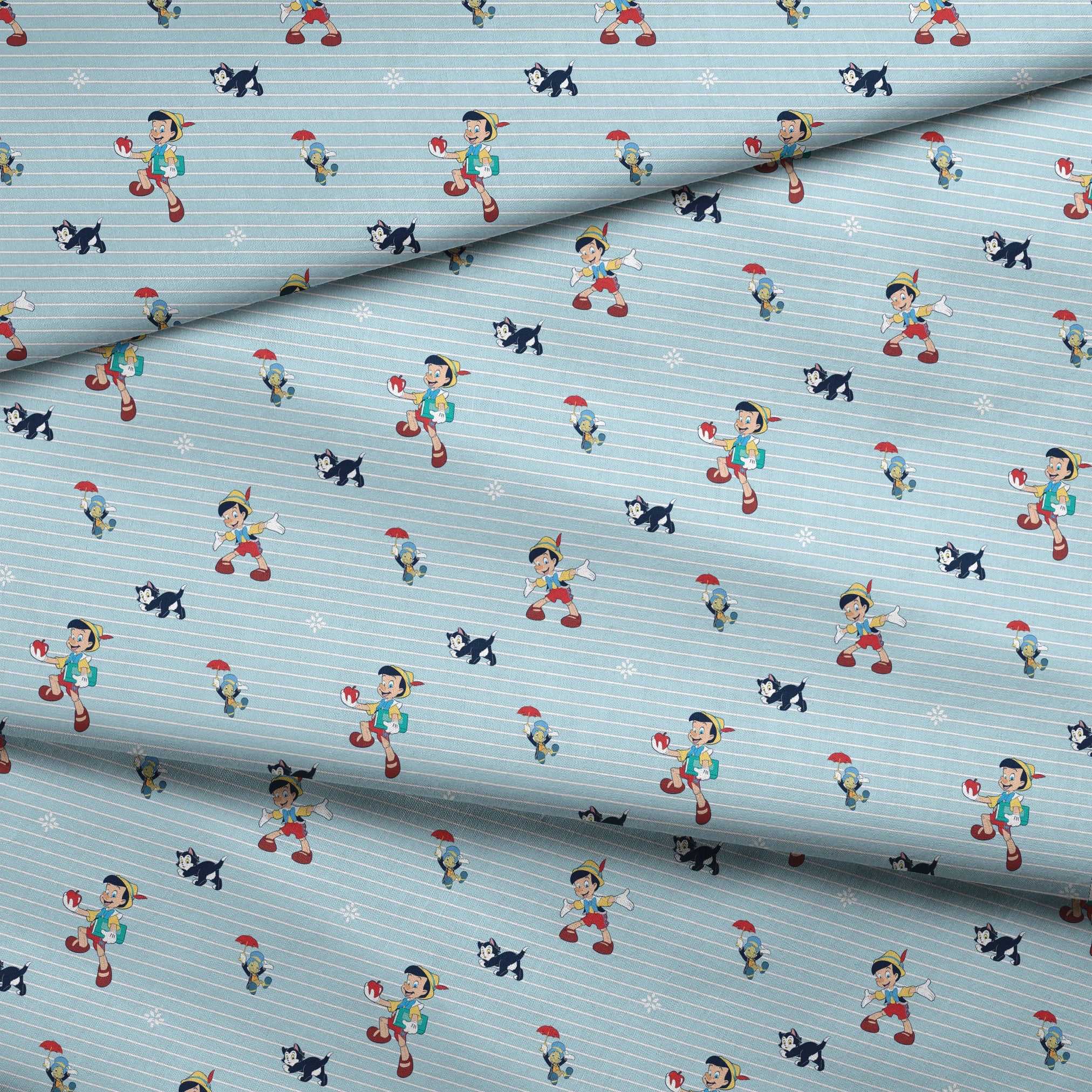 Cartoon pattern with boy character holding apple, black kittens, snowflakes on light blue striped background fabric fold mockup