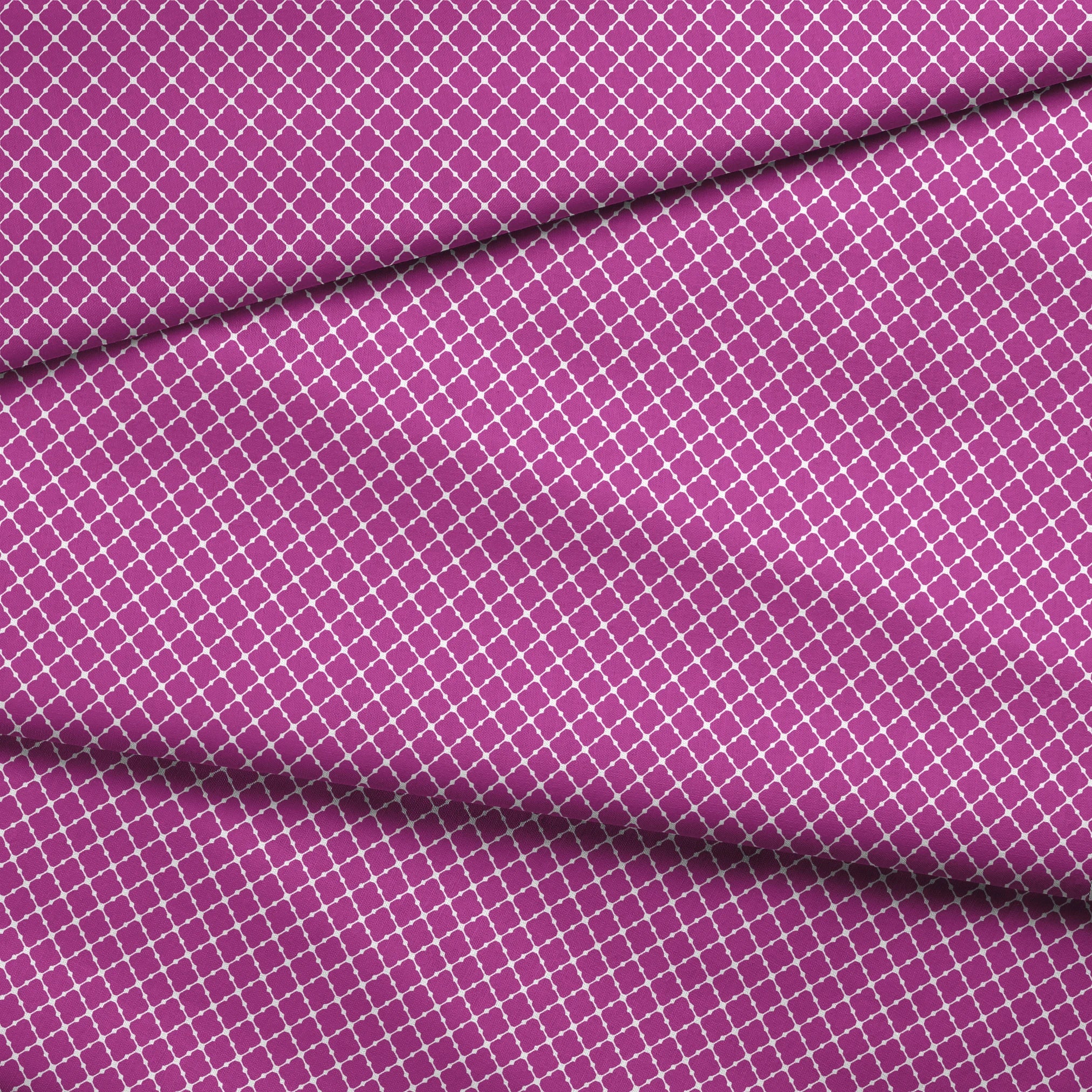 Magenta quatrefoil pattern with white lattice outline fabric fold mockup