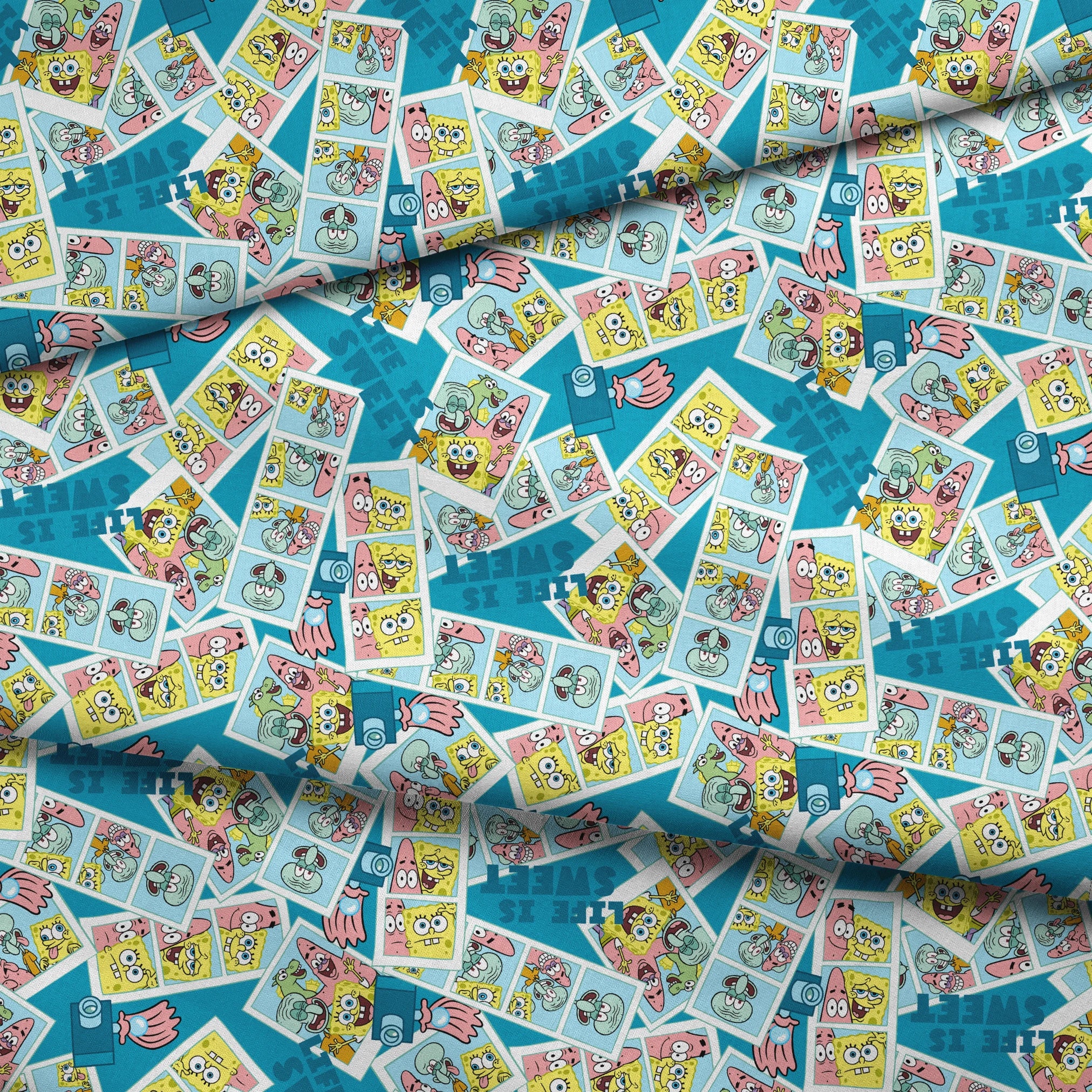 Photobooth-style SpongeBob SquarePants design featuring cartoon snapshots of SpongeBob, Patrick, and Squidward with “Life is Sweet” text on a blue background. fabric fold mockup