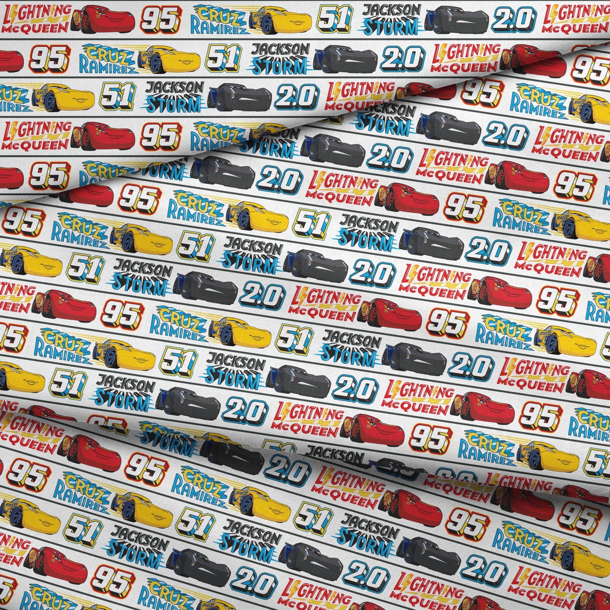 Disney Cars character ribbon with Lightning McQueen 95, Cruz Ramirez 51, and Jackson Storm 20 repeated pattern fabric fold mockup
