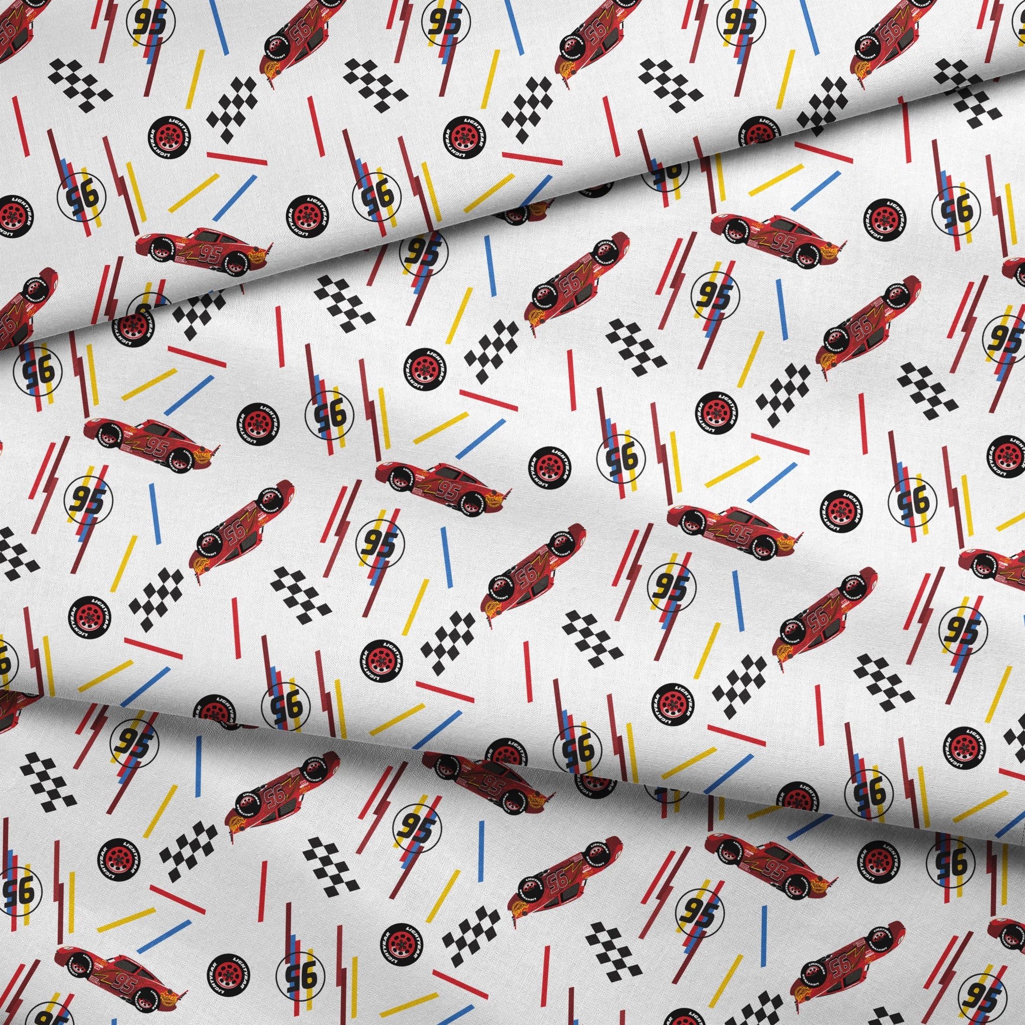 Racing car pattern with red toy cars, checkered flags, number 95 emblems, and colorful lines on white background fabric fold mockup