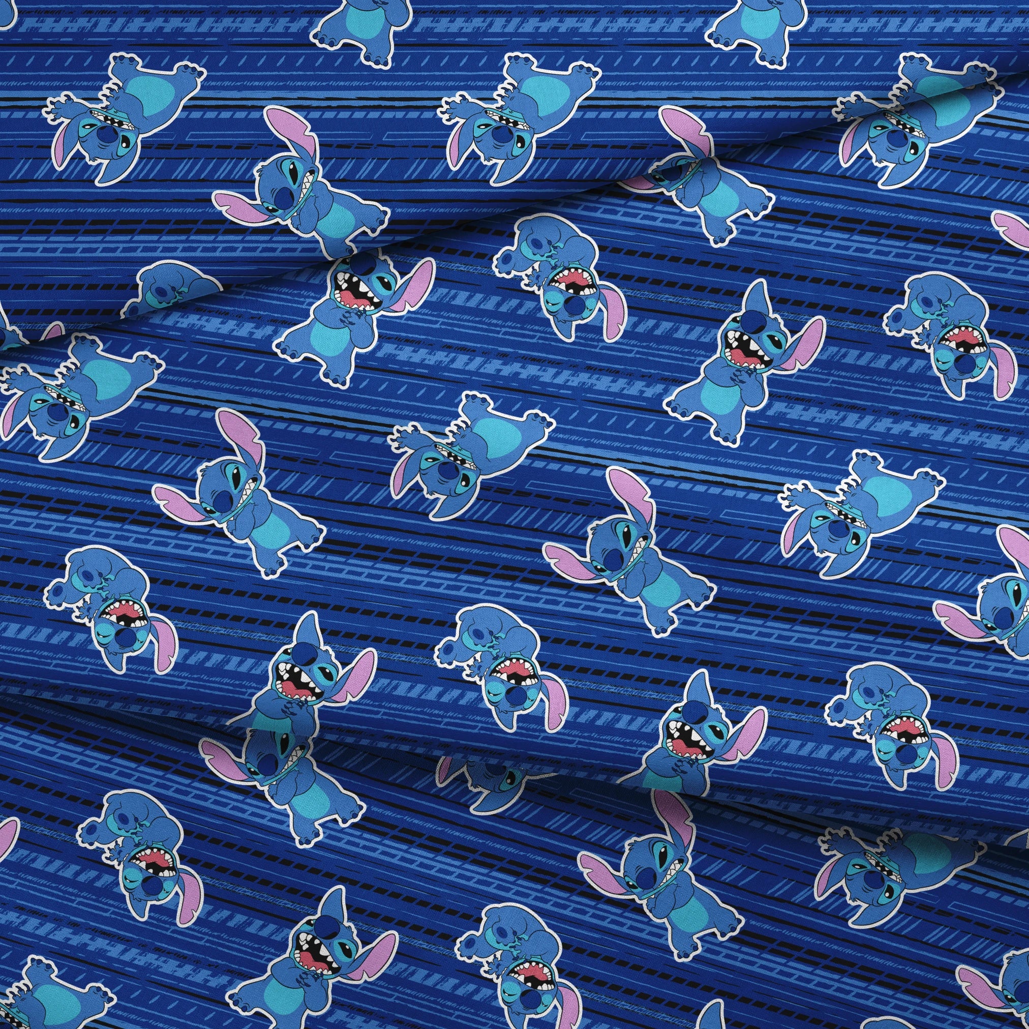 Blue background with Disney Stitch characters in various playful poses, featuring blue fur and pink ears fabric fold mockup