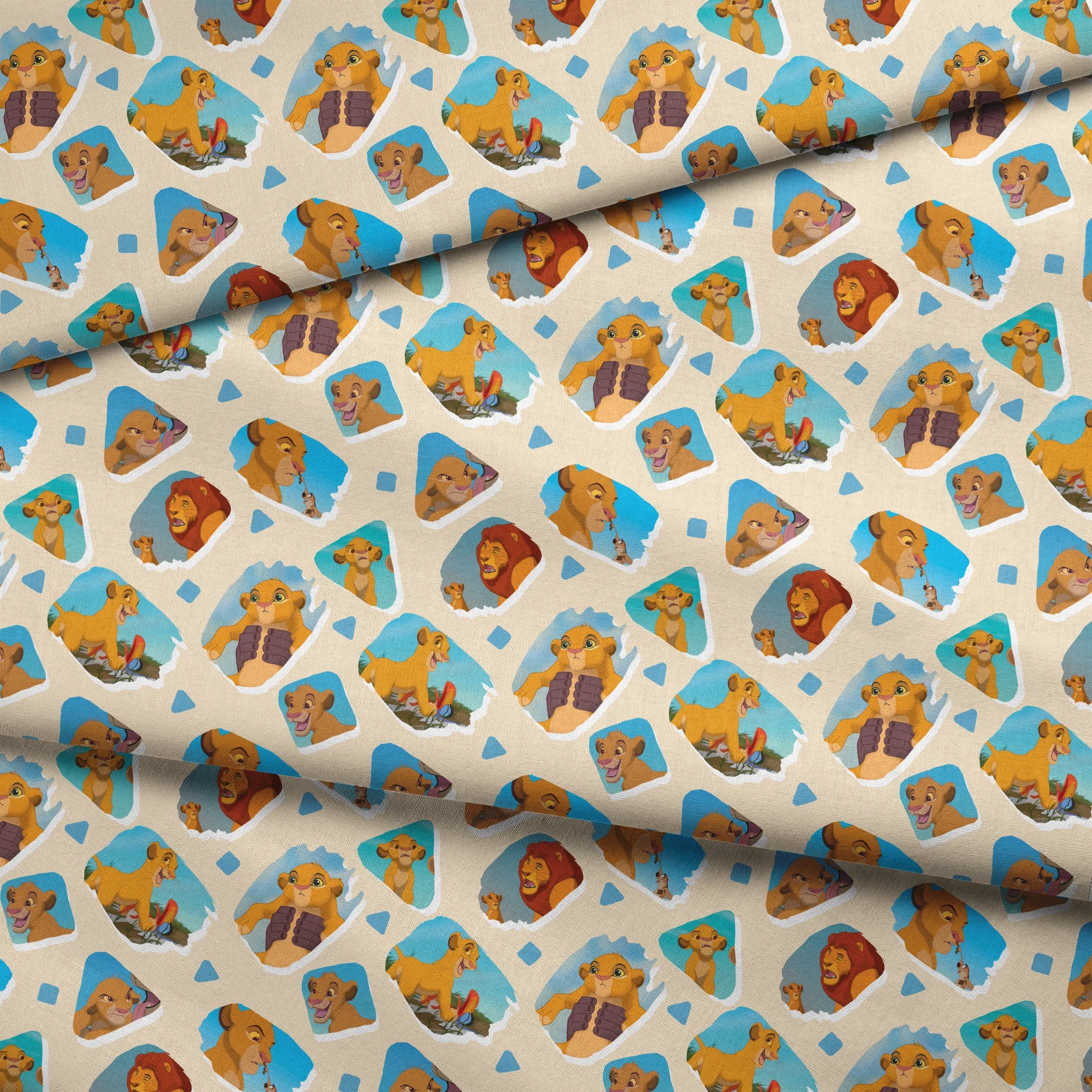 Young lion cub characters from The Lion King in a repeating pattern on cream background fabric fold mockup