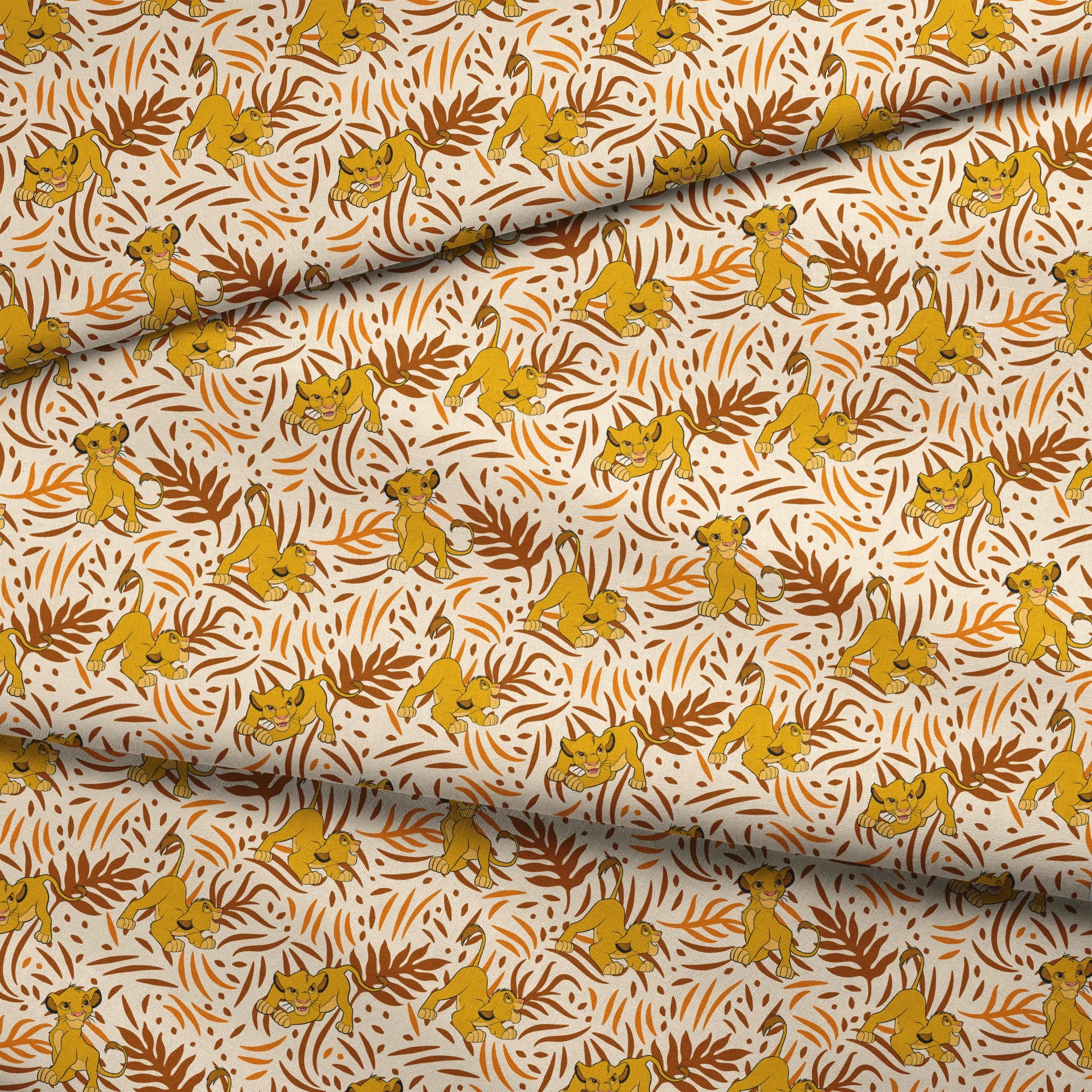 Cartoon lion cubs playing among stylized brown palm leaf pattern on cream background fabric fold mockup