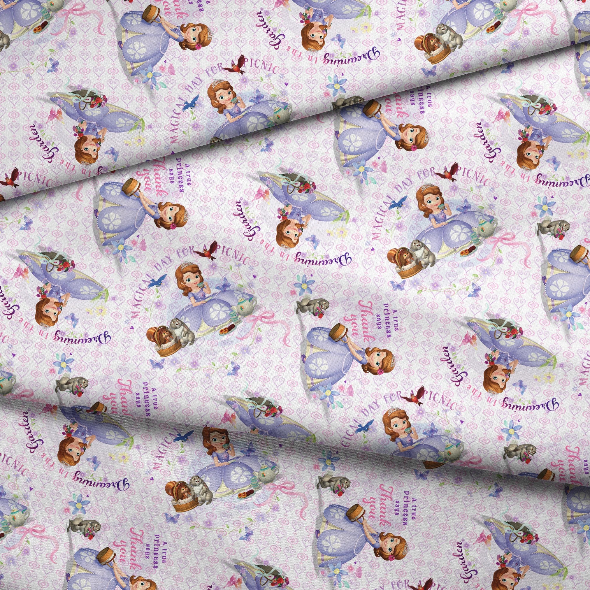 Disney Sofia the First Princess-themed pattern with characters in purple dresses, crowns, and the text "Beautiful Princess" on light purple background fabric fold mockup