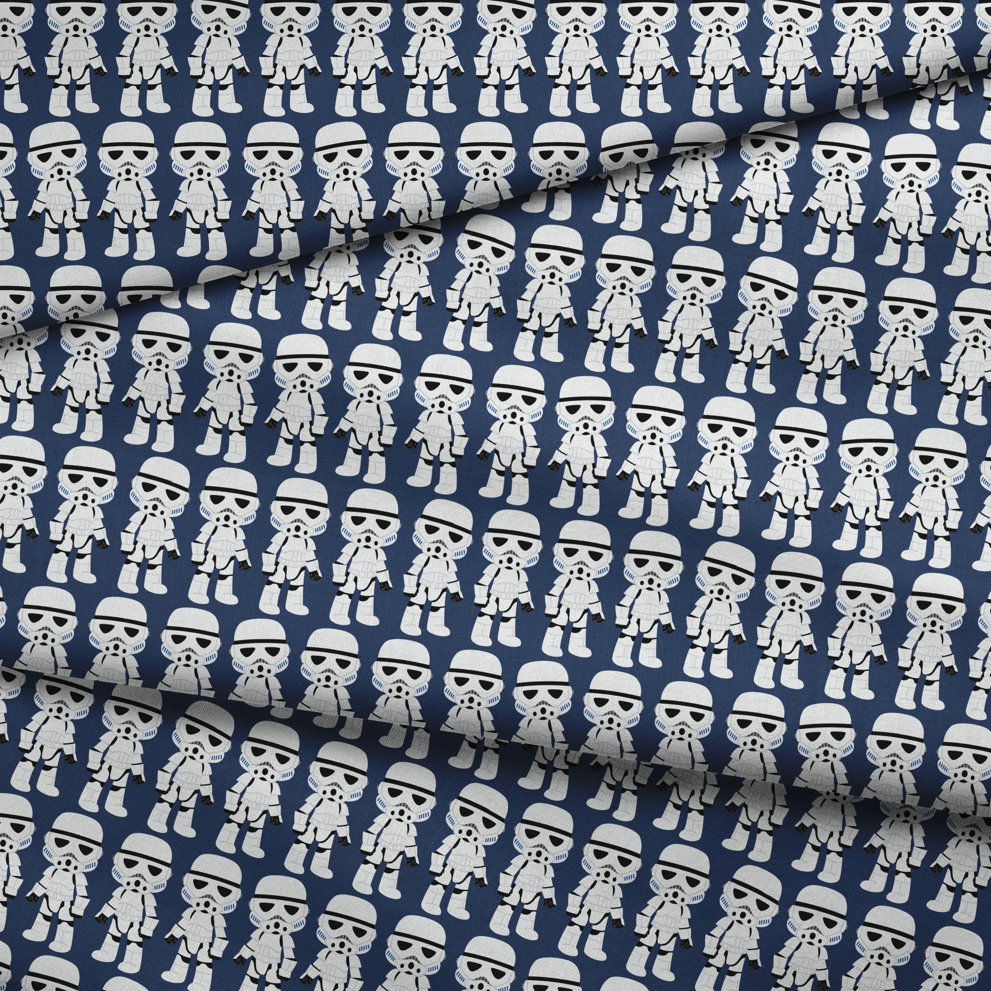 Repeated pattern of cartoon Stormtrooper characters in white armor against dark blue background fabric fold mockup