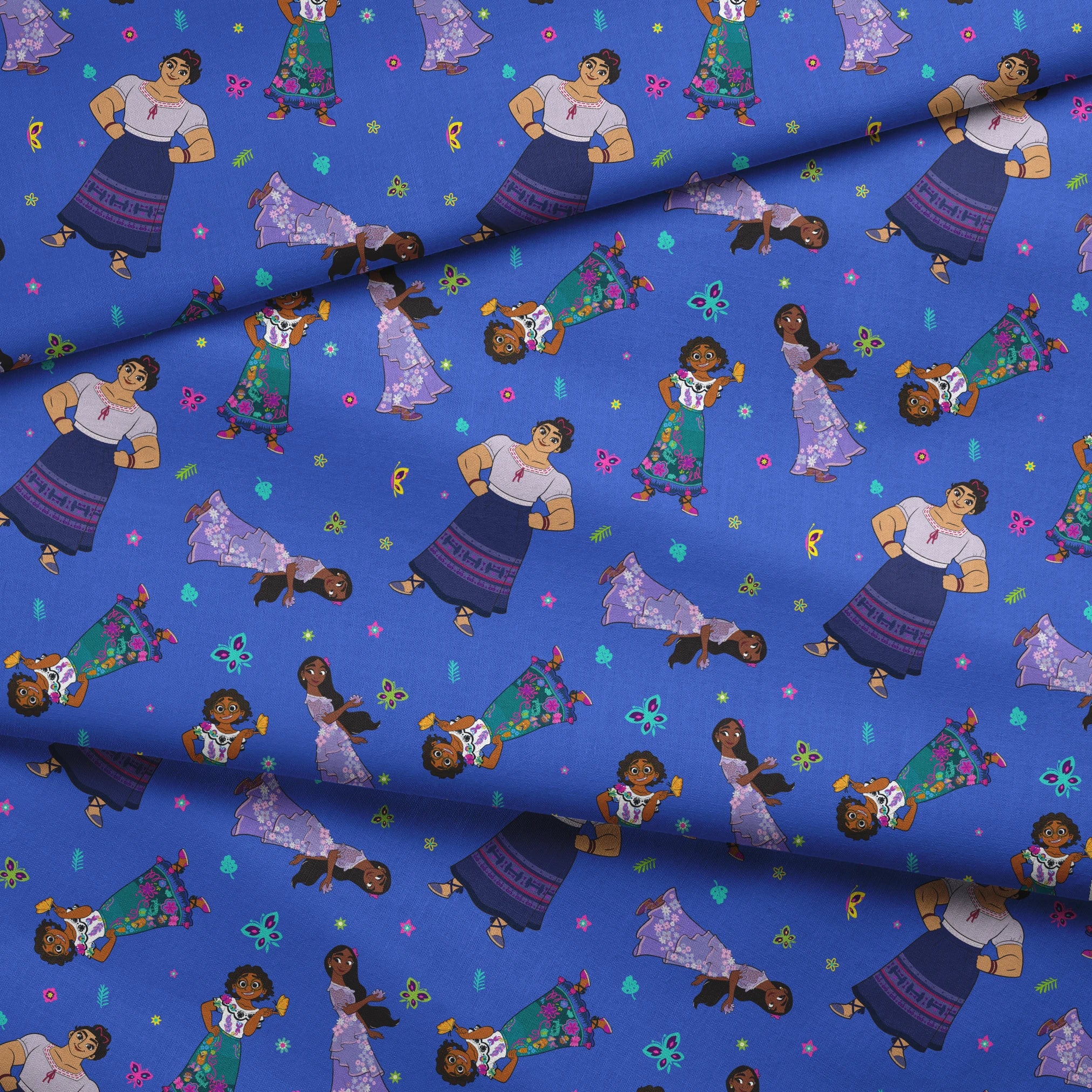 Colorful cartoon figures in traditional clothing floating on vibrant blue background with butterflies and flowers fabric fold mockup