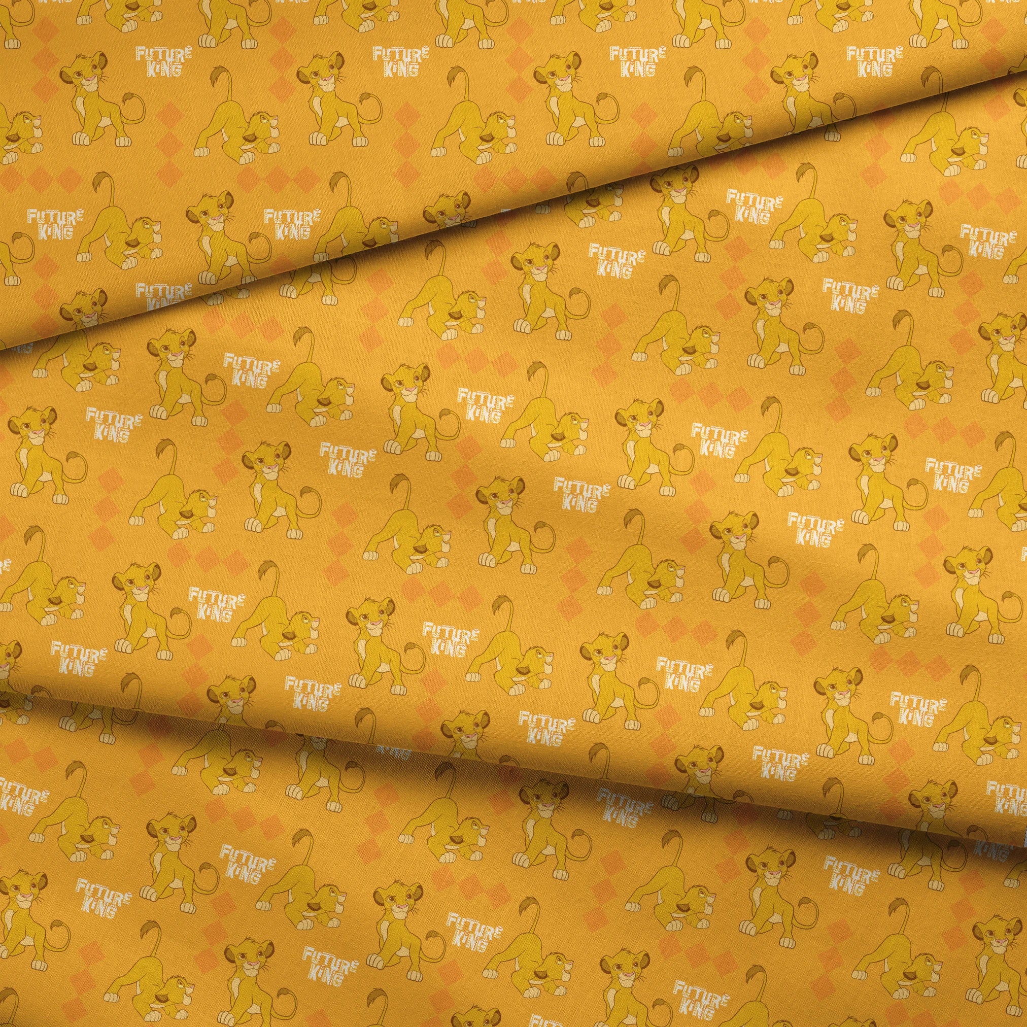 Young lion cub cartoon pattern on orange diamond background with "Future King" text fabric fold mockup