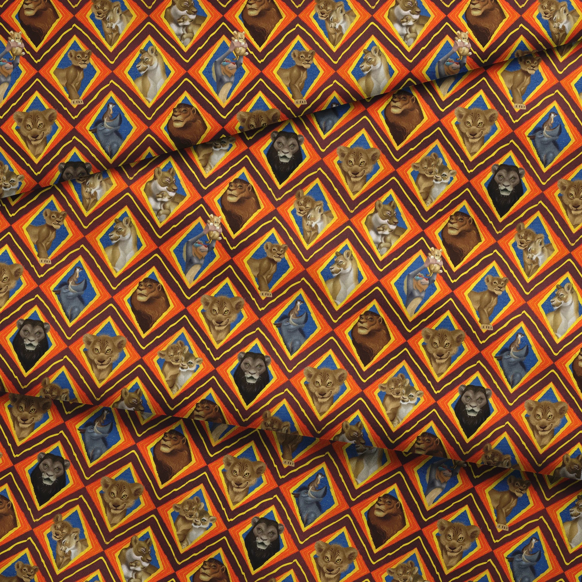 Diamond pattern of illustrated lions with various expressions in brown, tan, and gray against colorful geometric backgrounds. fabric fold mockup