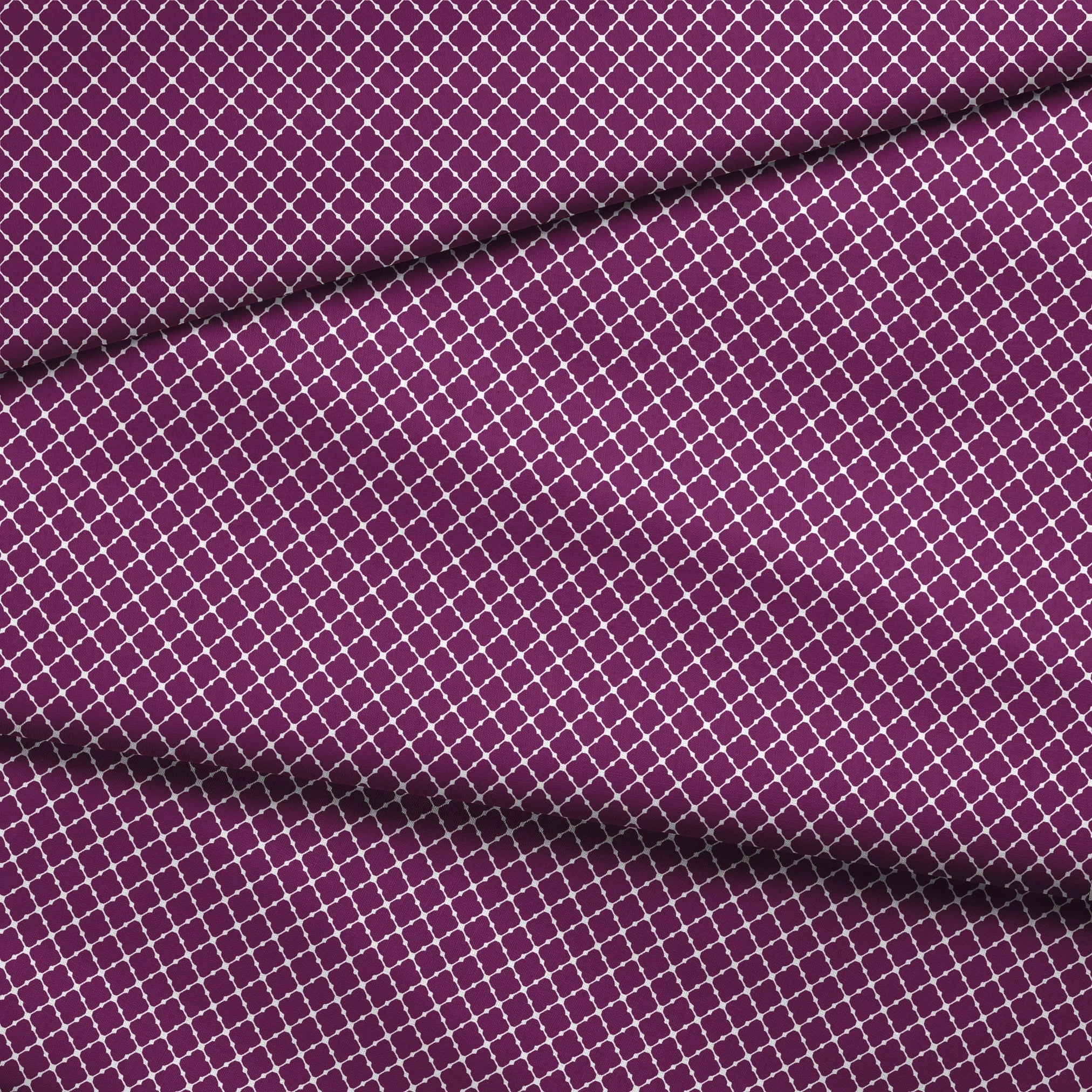 Plum quatrefoil pattern with white lattice outline on deep plum background fabric fold mockup