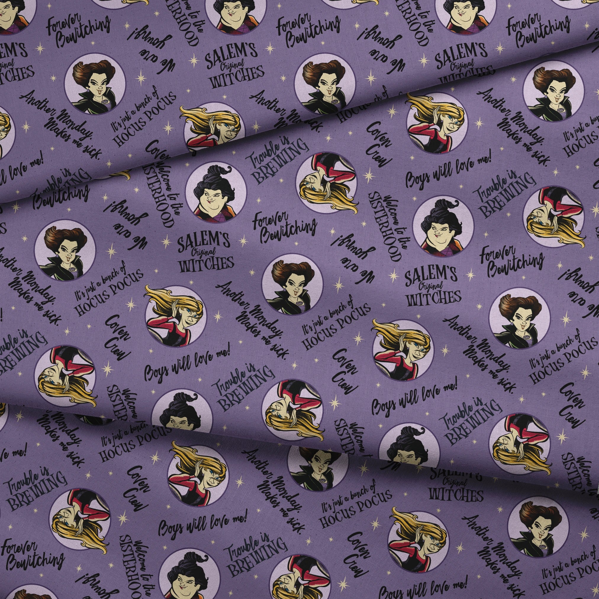 Purple background pattern with cartoon witches in circles, magical phrases and stars scattered throughout in black text fabric fold mockup