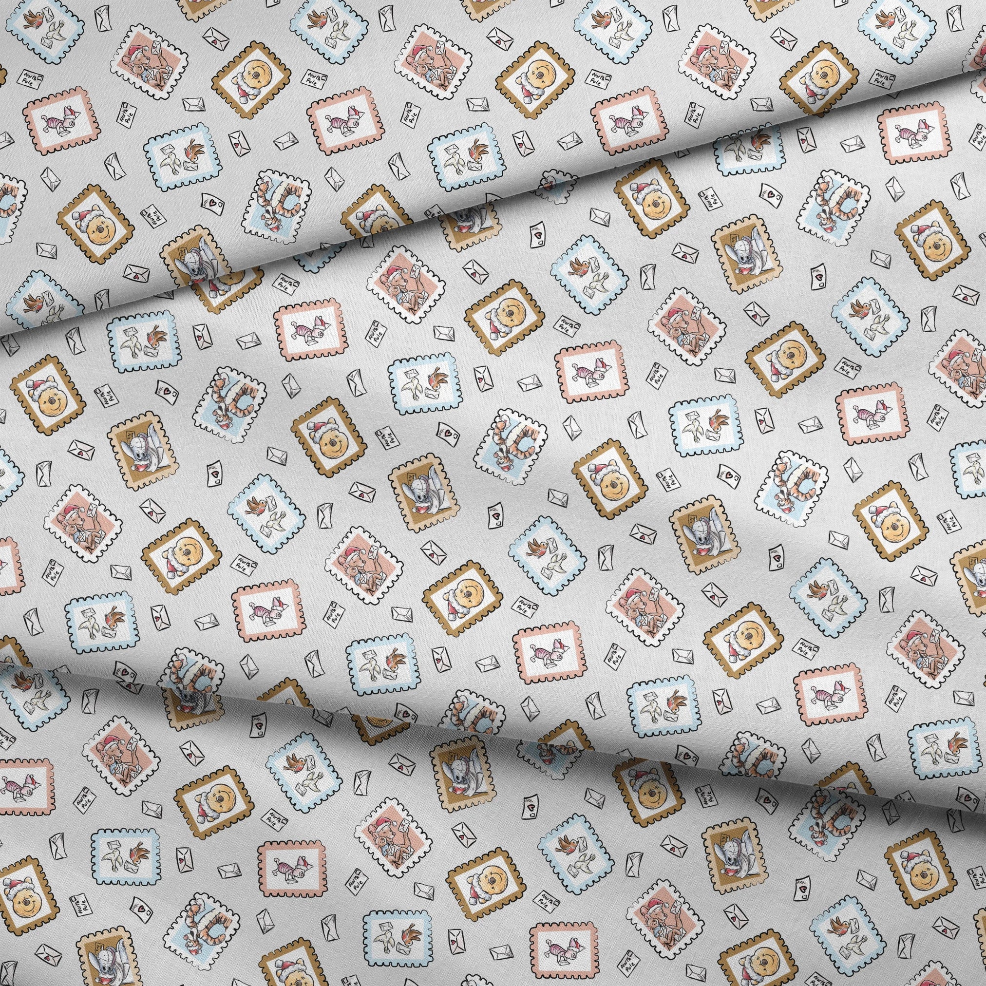 Vintage-style postage stamps with fairy tale illustrations on a light gray background with envelo... fabric fold mockup