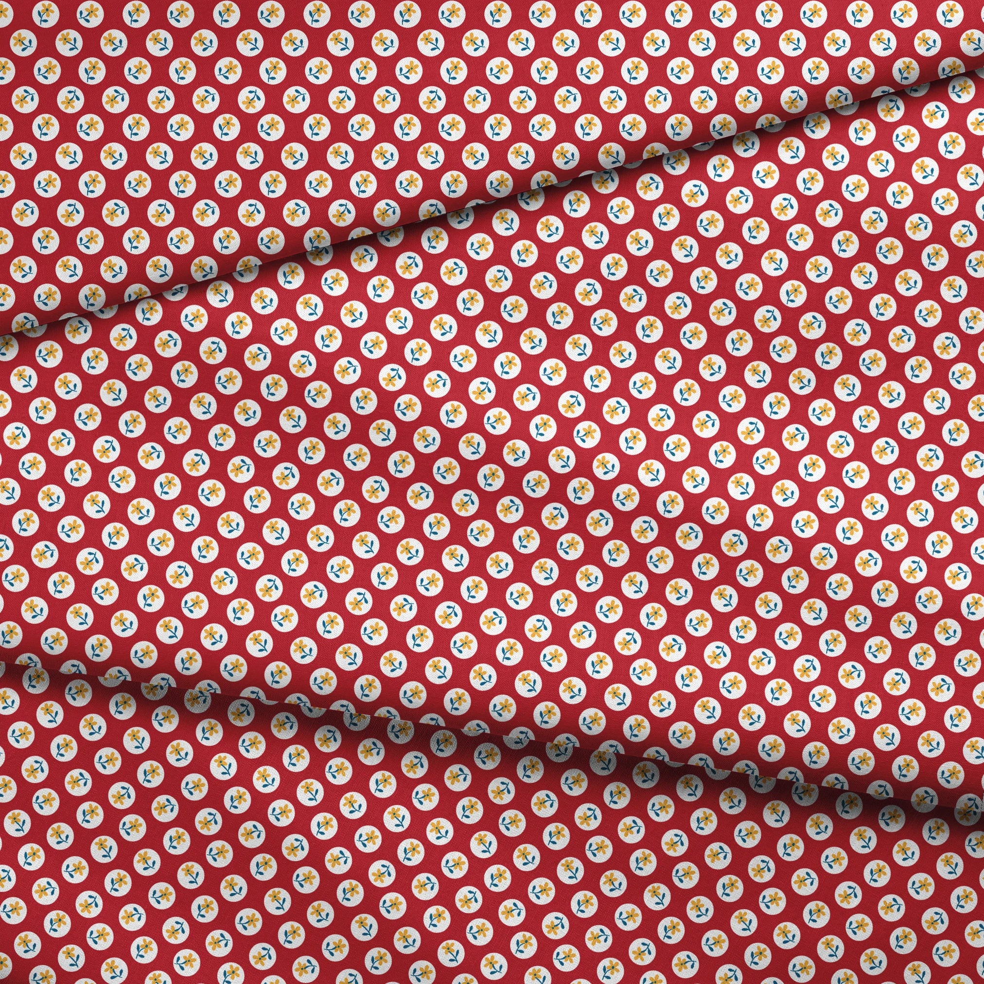 Yellow flowers with blue stems on white circles against red background in repeating pattern fabric fold mockup