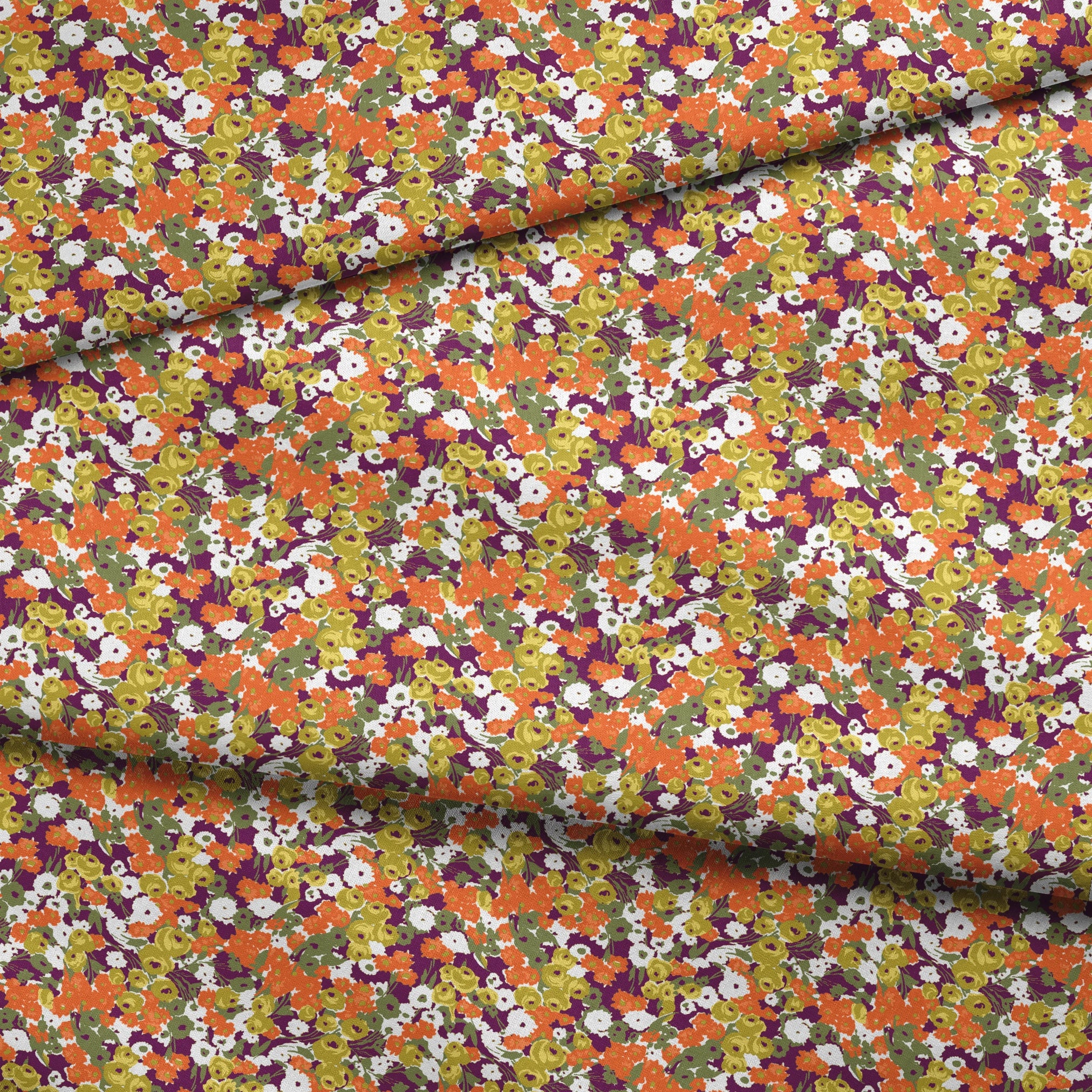 Vibrant floral pattern with white, orange, yellow, green, and purple abstract blooms fabric fold mockup