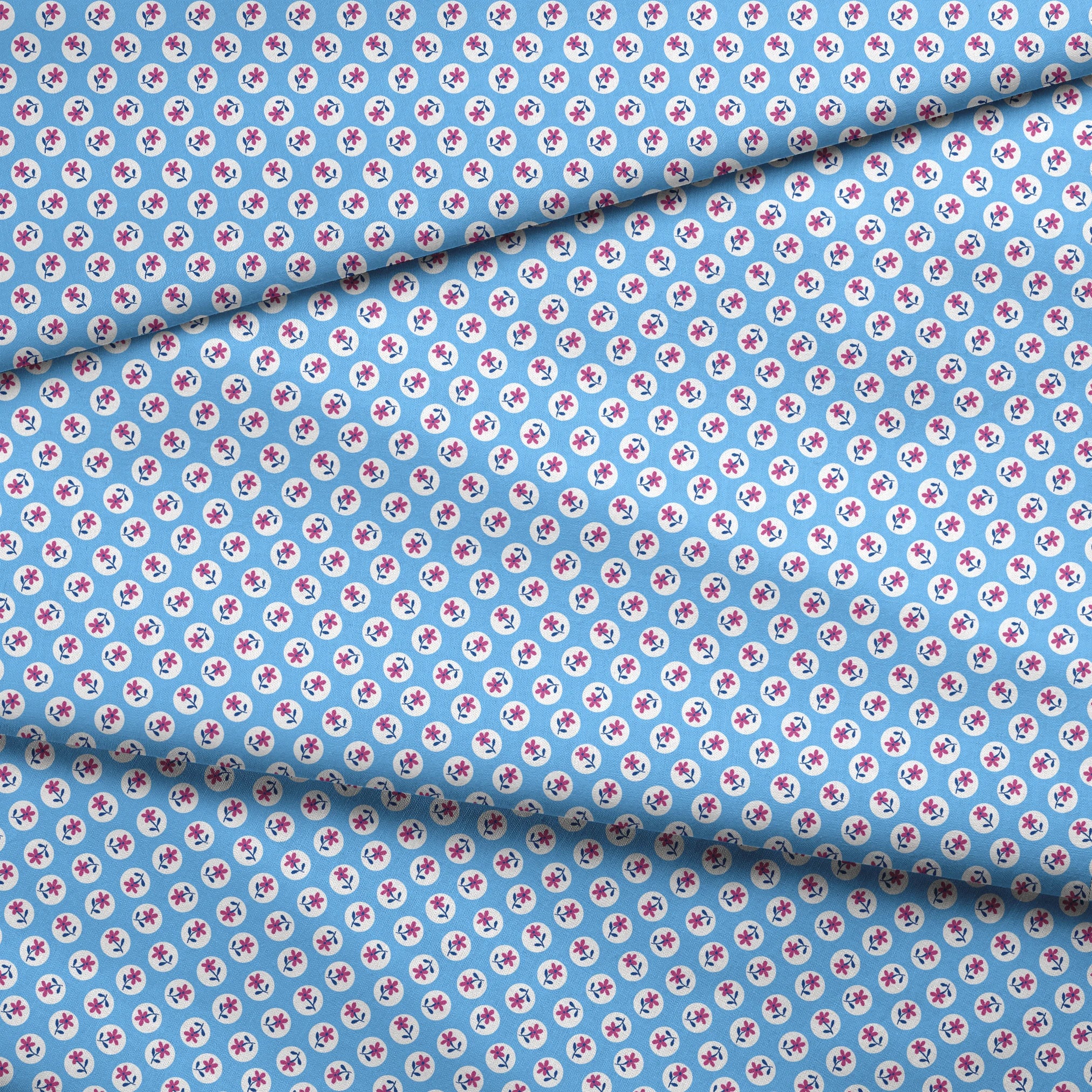Purple flowers with blue stems inside white circles on light blue background pattern fabric fold mockup