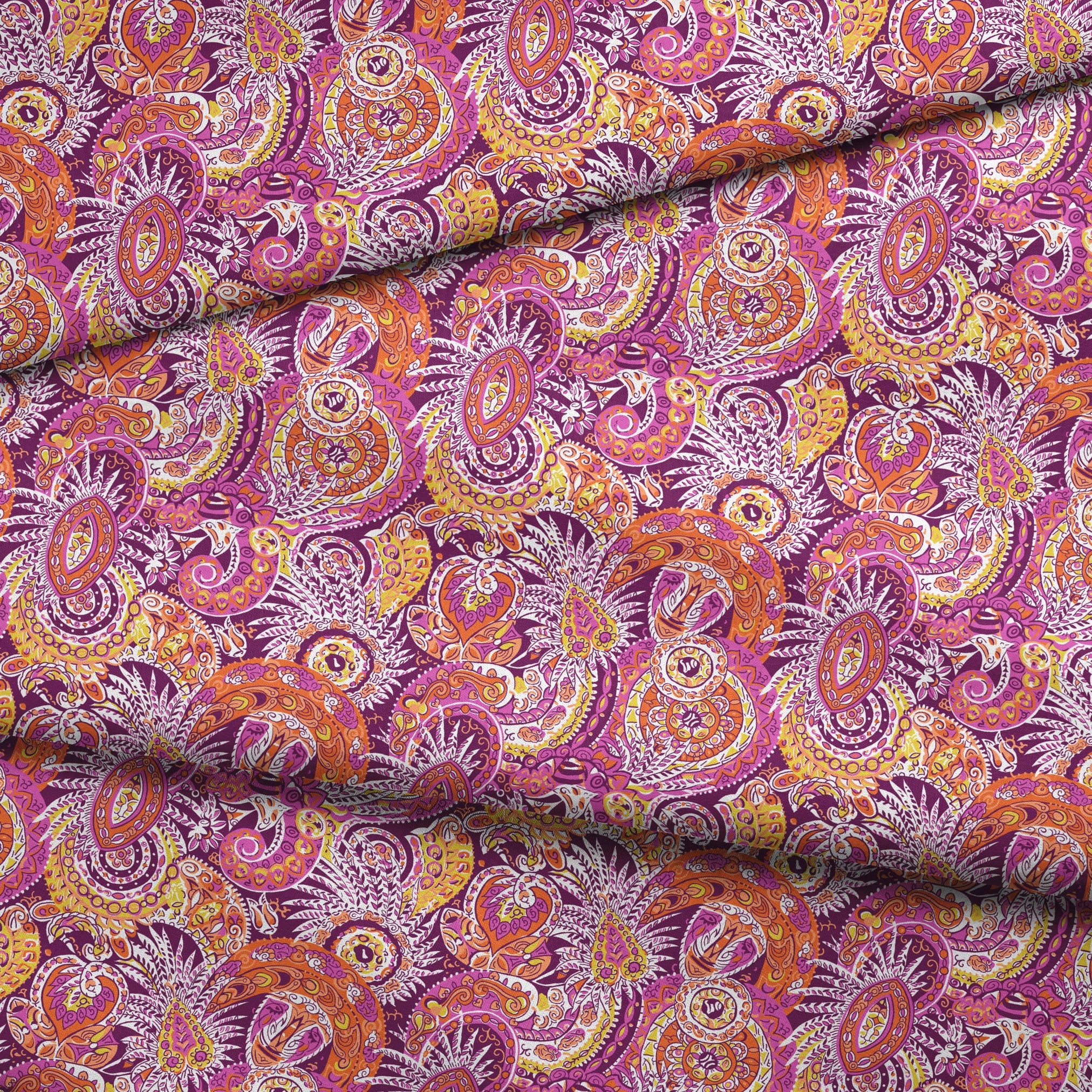 Vibrant paisley pattern with swirling shapes in purple, orange, pink, and yellow tones fabric fold mockup