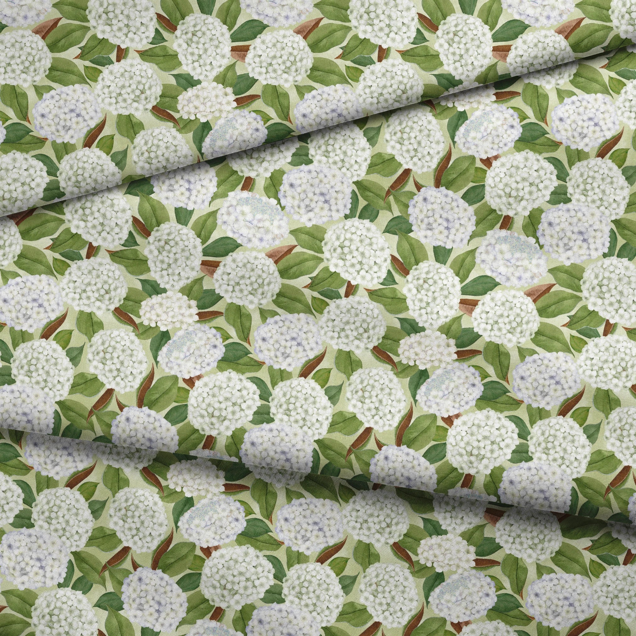 Realistic white hydrangea clusters with green leaves on a soft cream background, designed by Nicole Tamarin in a timeless botanical style. fabric fold mockup