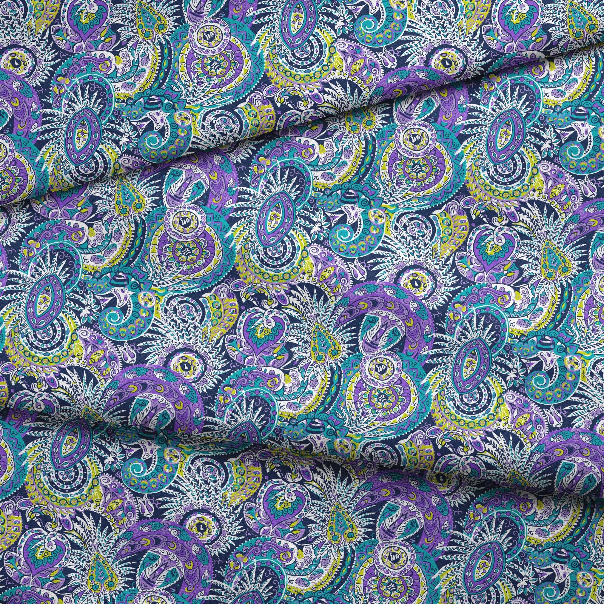 Vibrant paisley pattern with swirling designs in purple, blue, yellow, and white fabric fold mockup