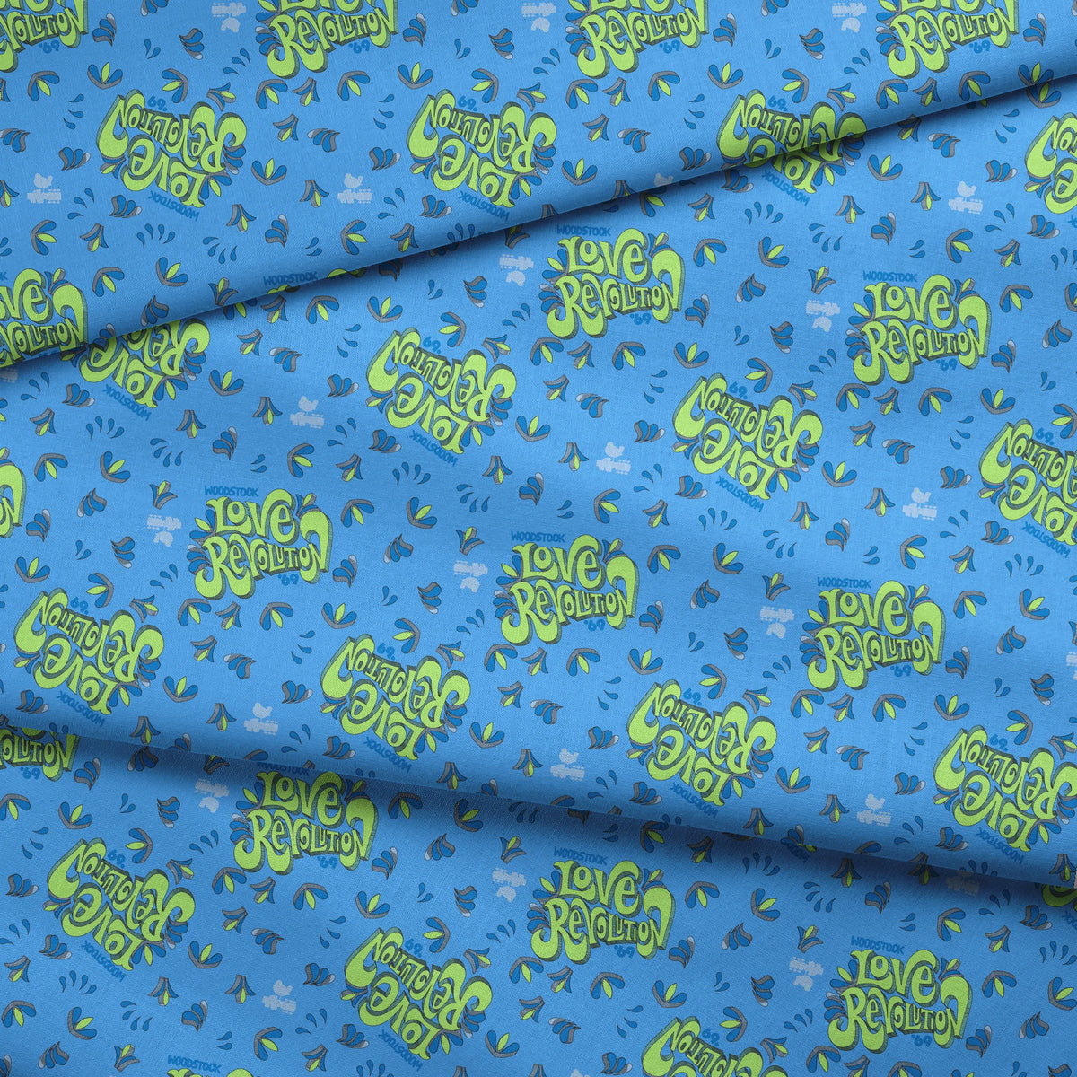 Woodstock Love Revolution on Blue Fabric