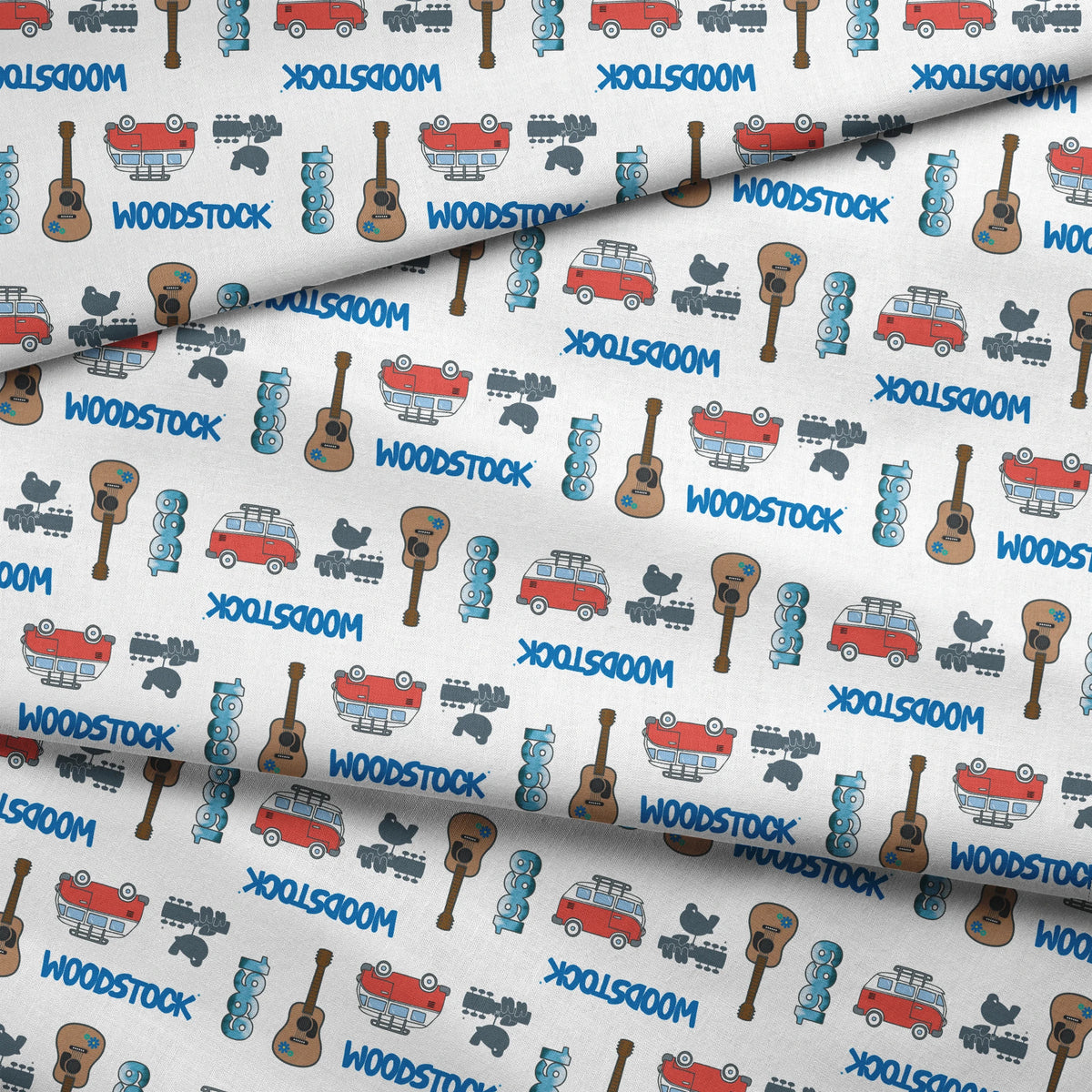 Woodstock Guitars and Vans on White Fabric