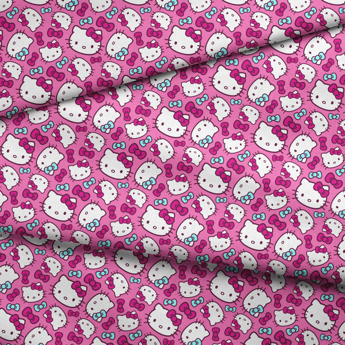 Hello Kitty® Pink and Blue Bows Fabric