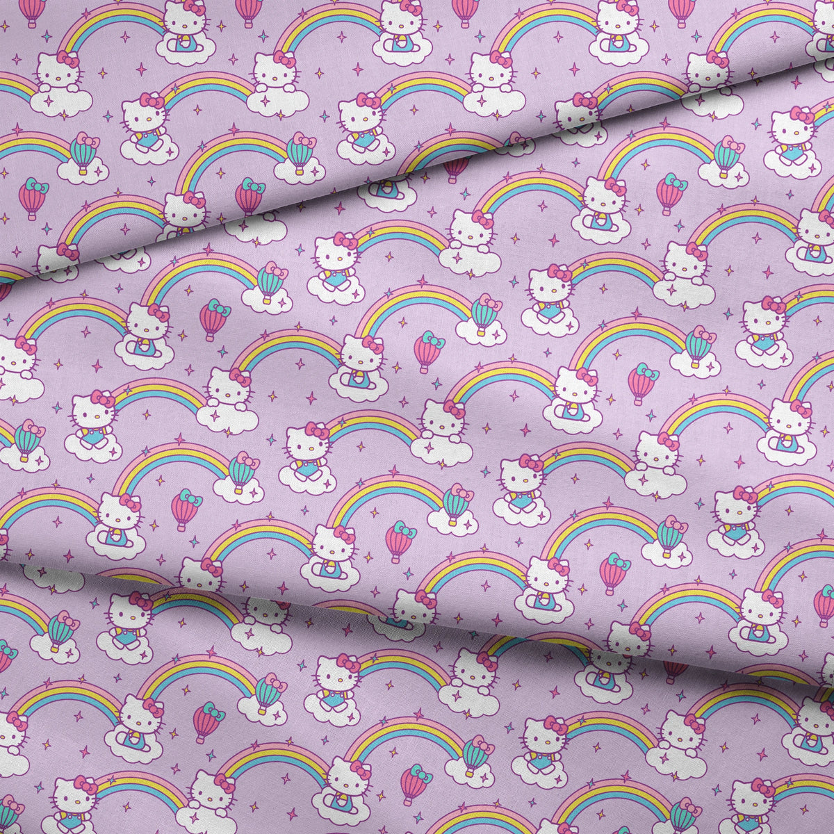 Hello Kitty® Rainbows & Clouds on Purple Fabric