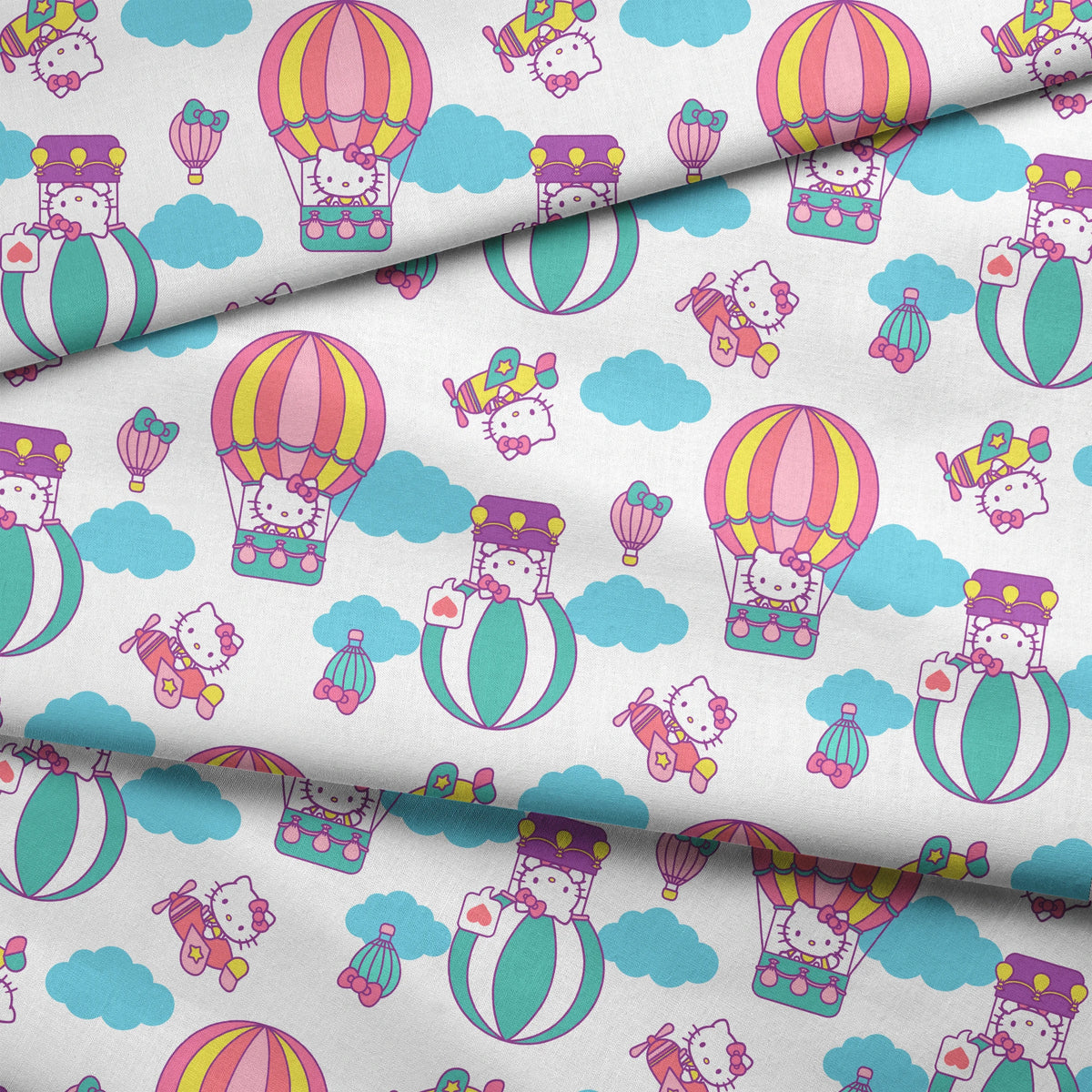 Hello Kitty® Hot Air Balloons on White Fabric
