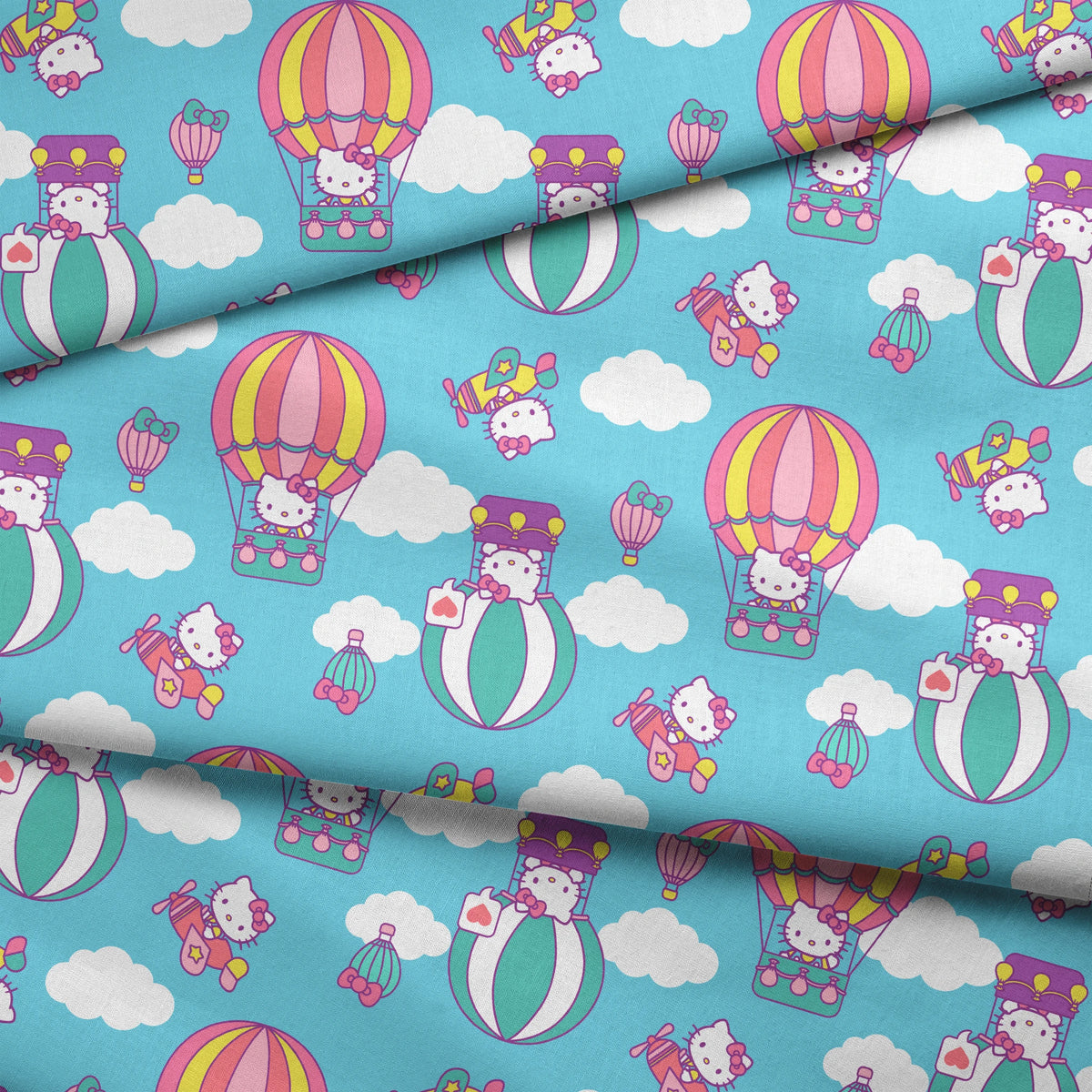 Hello Kitty® Hot Air Balloons on Blue Fabric