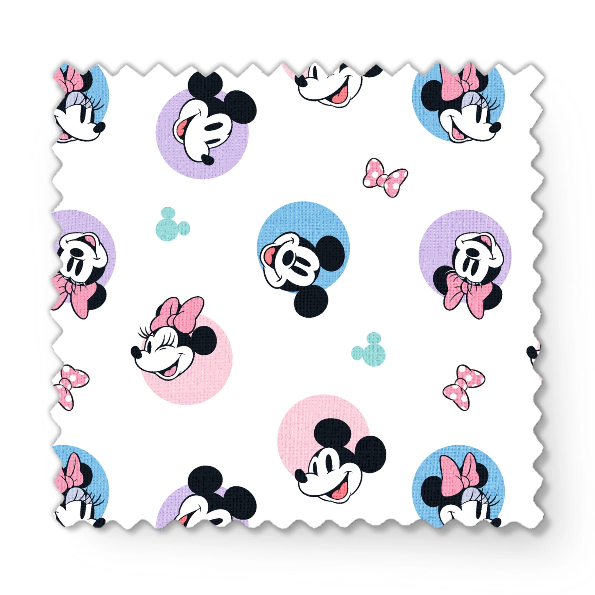 Disney Mickey and Minnie Mouse pattern with character heads on pastel circles, pink bows, and small Mickey icons fabric swatch mockup