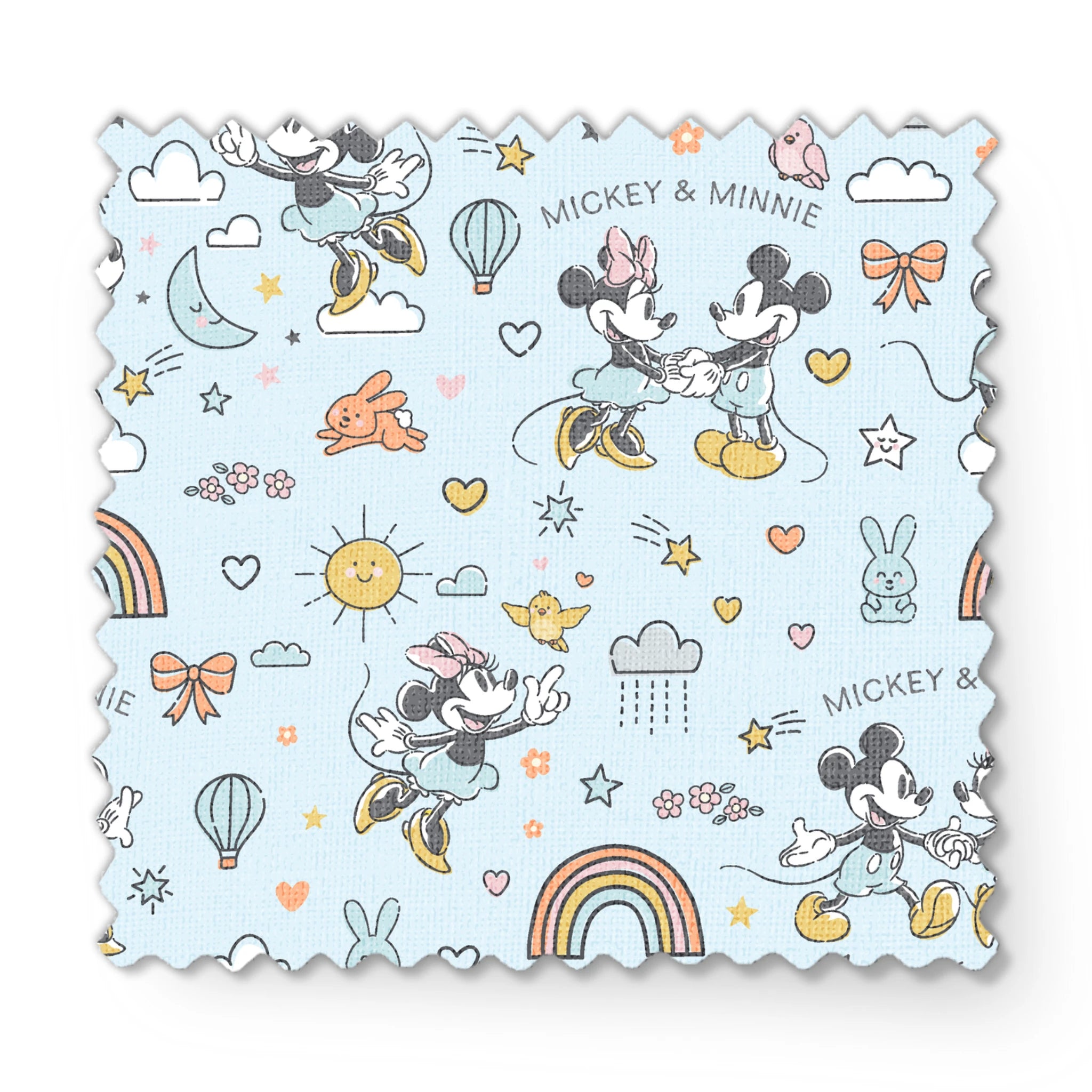 Playful Disney pattern with classic cartoon characters, rainbows, hearts, and whimsical elements on light blue background. fabric swatch mockup