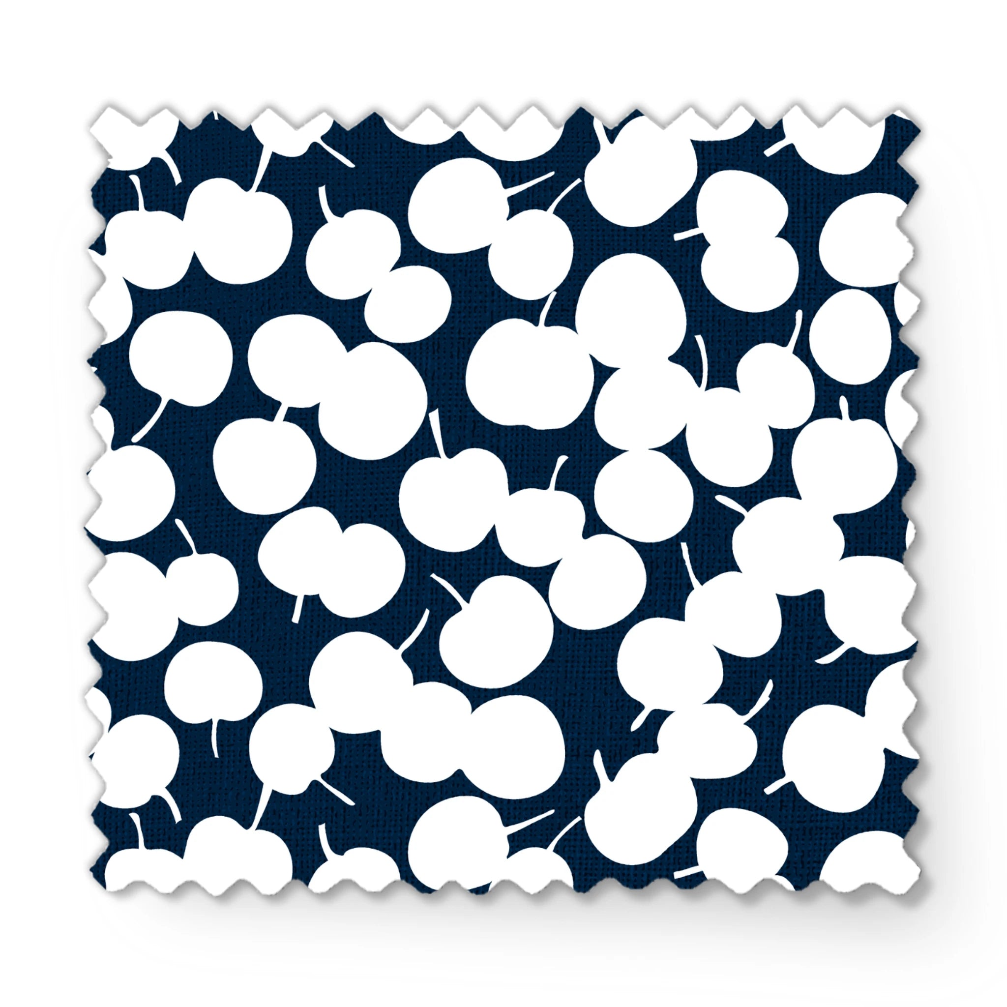 White cherry silhouettes scattered across a deep navy blue background in a playful pattern fabric swatch mockup