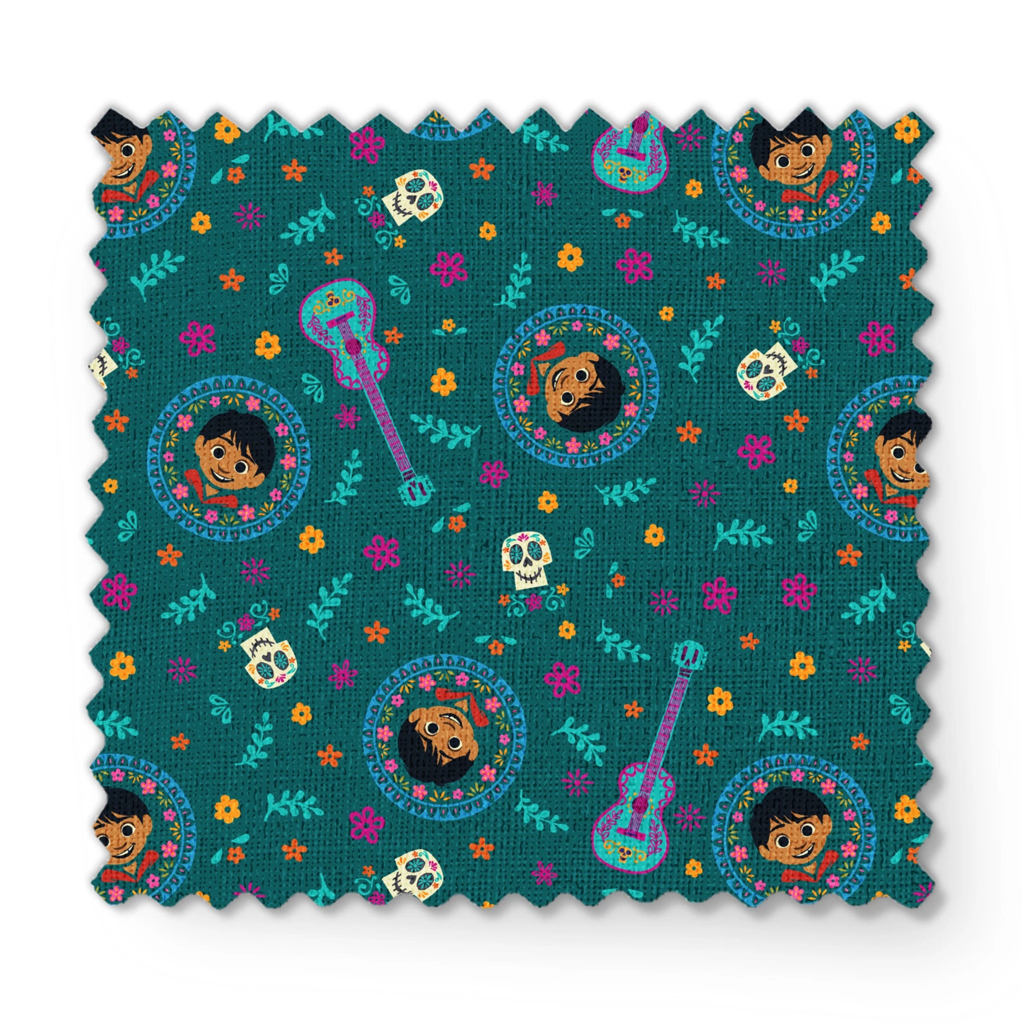 Colorful Coco-inspired pattern with guitars, sugar skulls, circular portraits, and floral elements on teal background. fabric swatch mockup