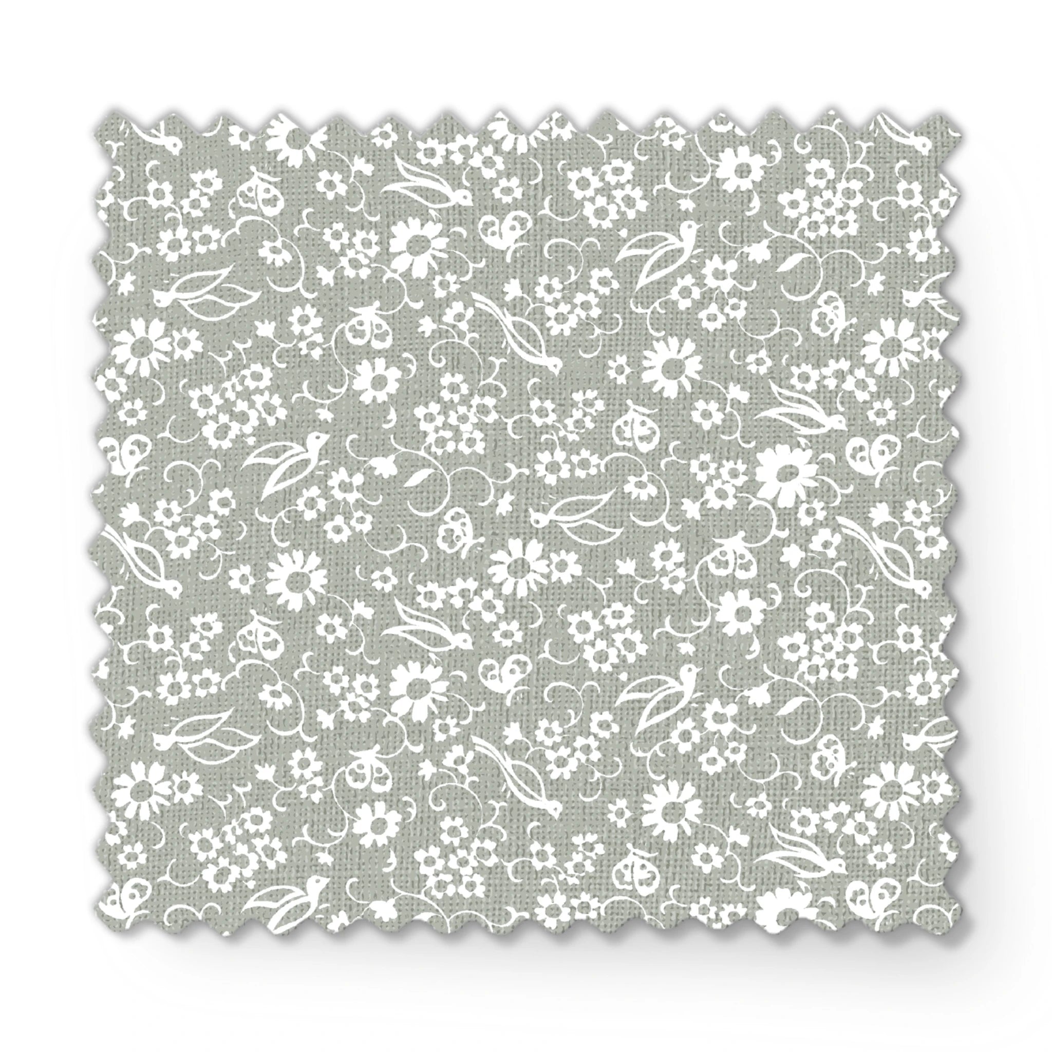 White vintage-style bird and floral silhouettes on a soft gray background. fabric swatch mockup