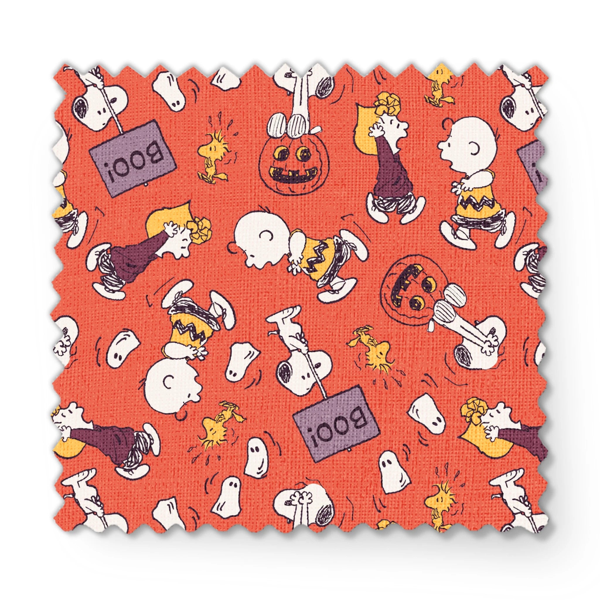 Snoopy and Woodstock Halloween pattern on orange background with pumpkins, ghosts, and "boo" text fabric swatch mockup