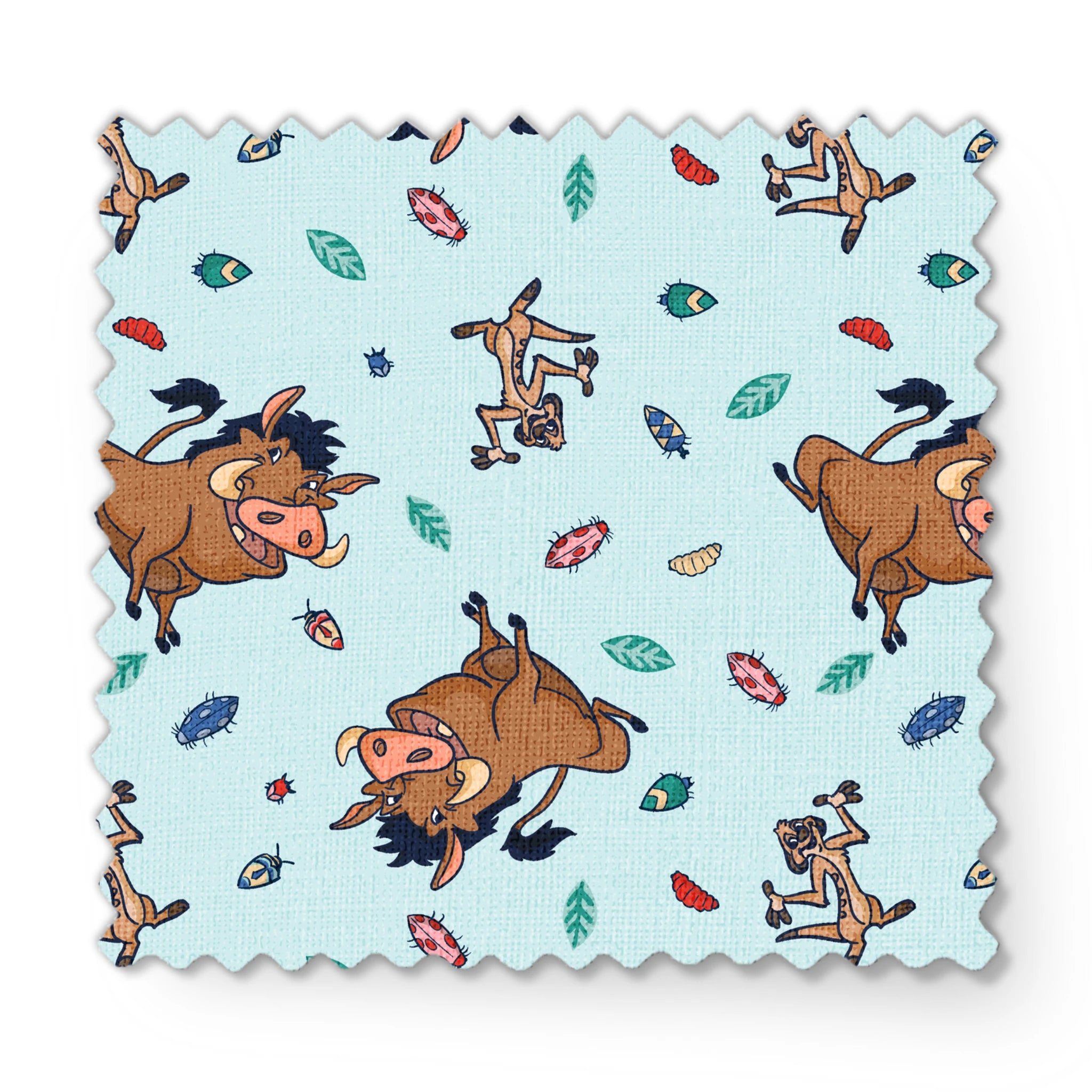 Lion King characters and colorful leaves scattered on light blue background in playful pattern fabric swatch mockup