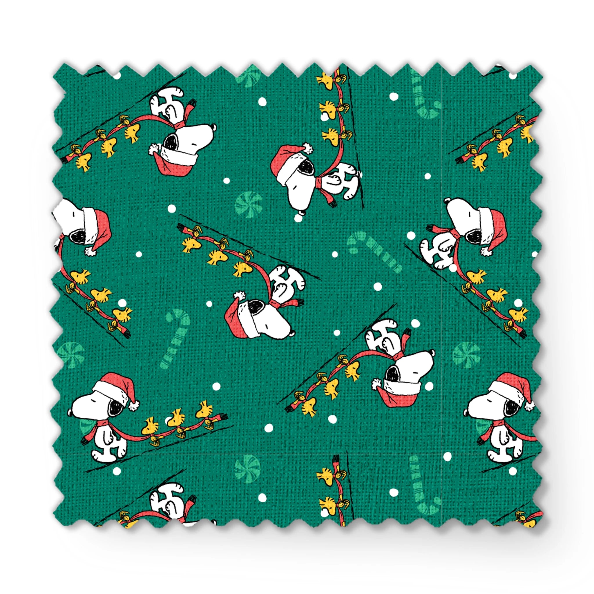 Holiday pattern with Snoopy in Santa hats pulling sleds of stars on green background with candy canes and snowflakes fabric swatch mockup