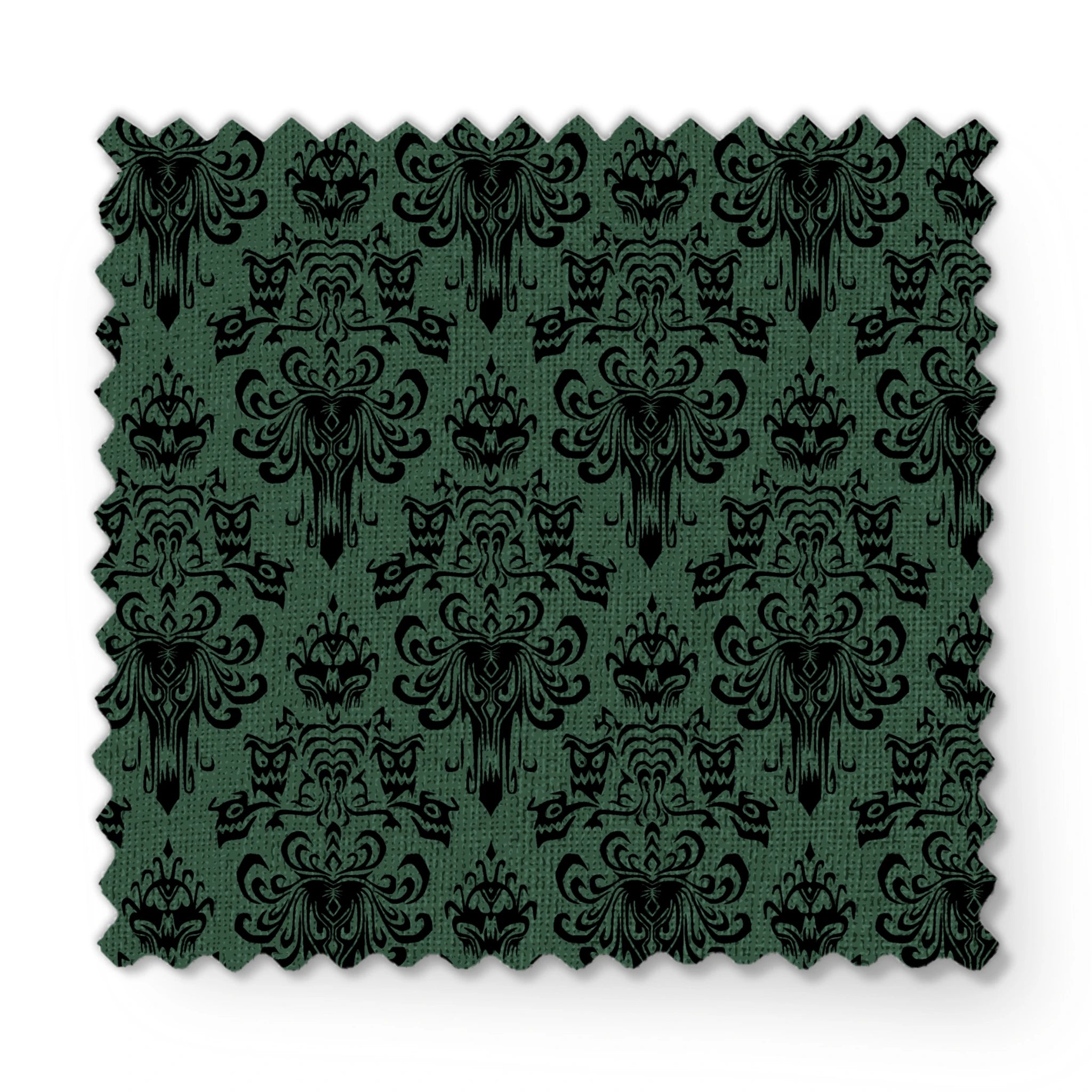 The image shows an elegant Victorian or Gothic-style damask pattern in black against a dark green background. The repeating ornate design features intricate scrollwork, flourishes, and symmetrical decorative elements arranged in a traditional wallpaper or textile pattern style. fabric swatch mockup
