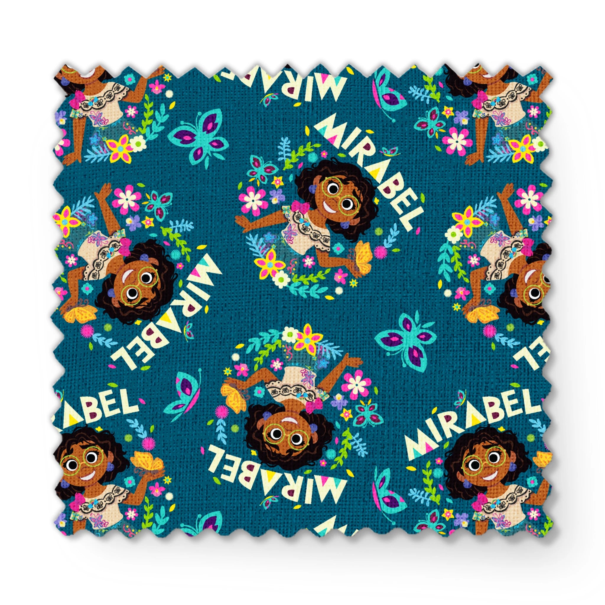 Colorful cartoon pattern on teal background featuring characters, butterflies, flowers, and "Mirabel" text in repeating design fabric swatch mockup