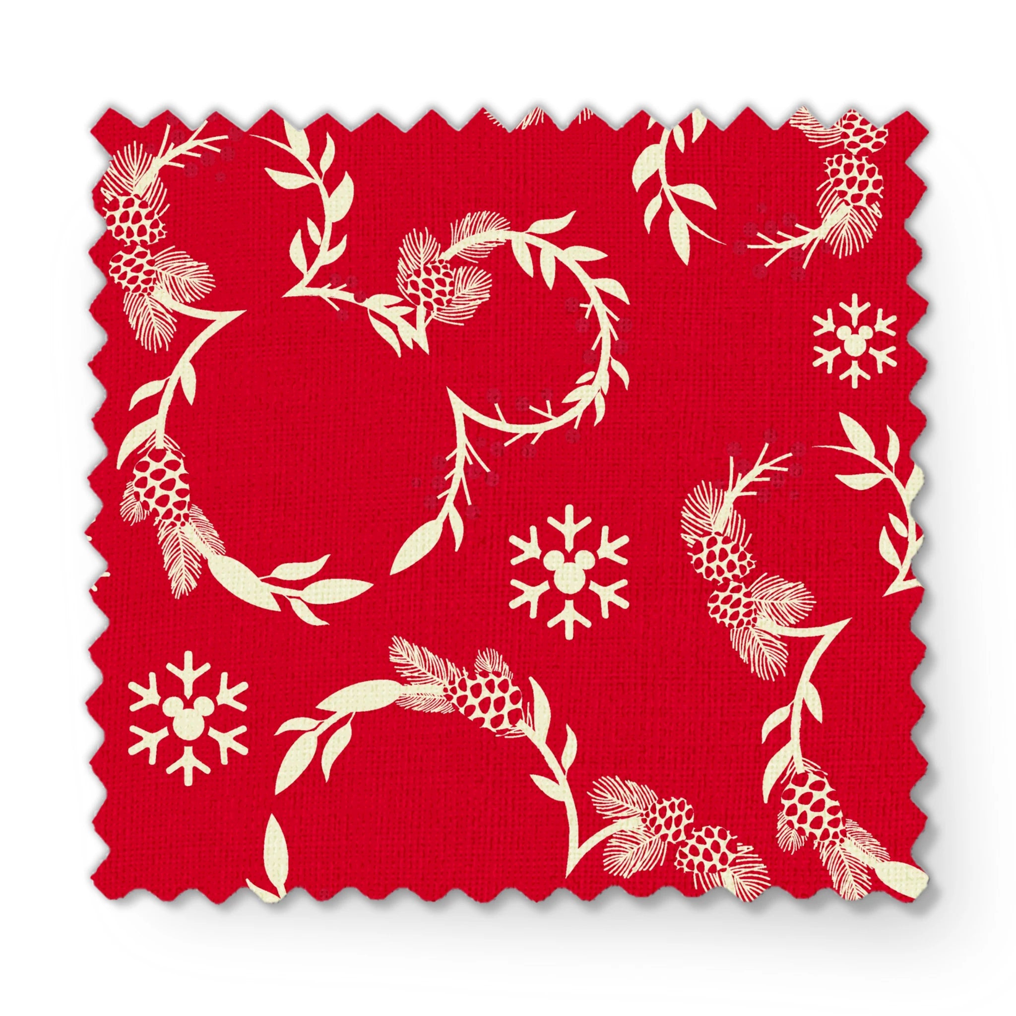 Festive red background with white floral wreaths, pine cones, and snowflake patterns fabric swatch mockup