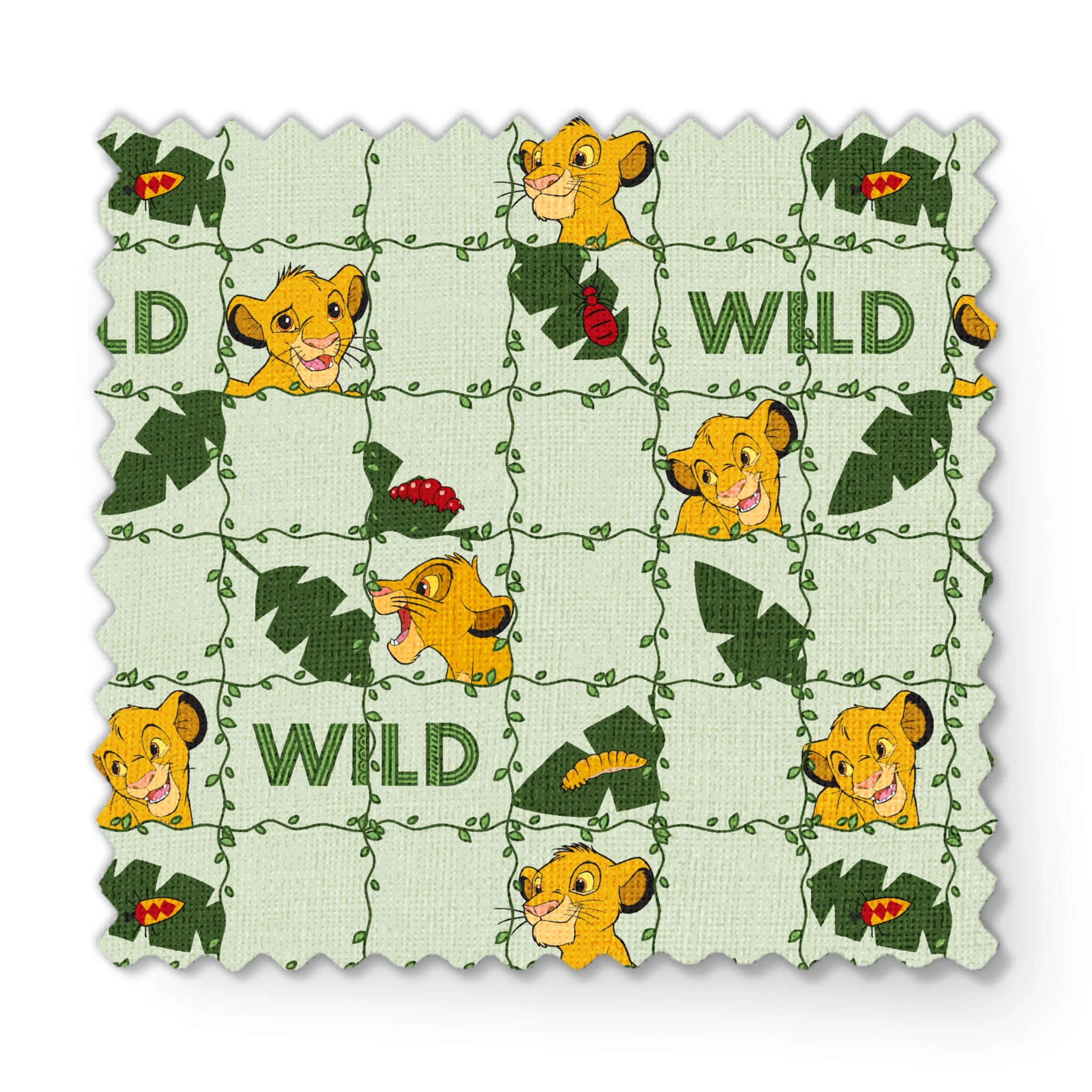 Young cartoon lion cubs with tropical leaves and "WILD" text on light green background pattern fabric swatch mockup